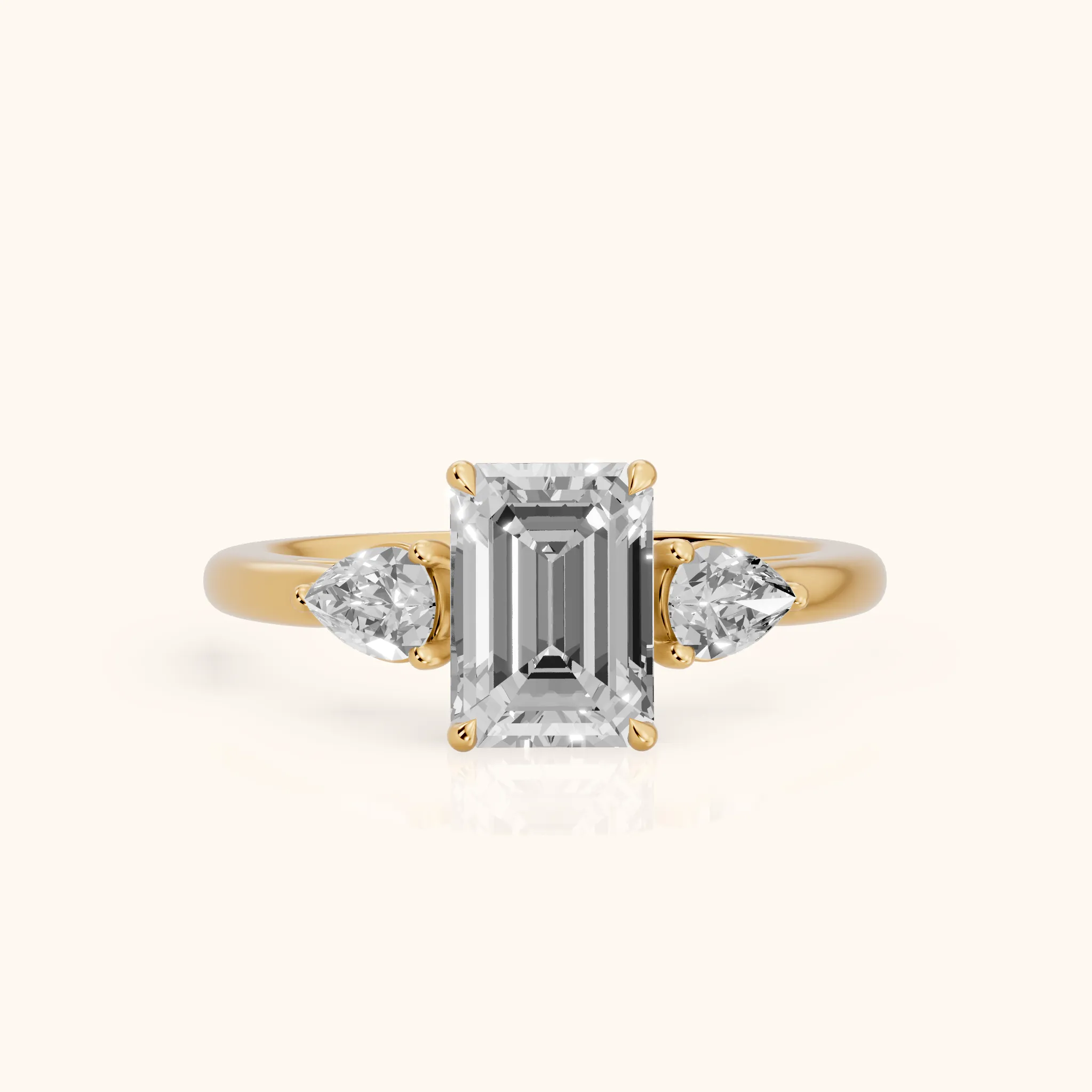 Phoebe Three-Stone Emerald Diamond Ring in Yellow Gold — view 1