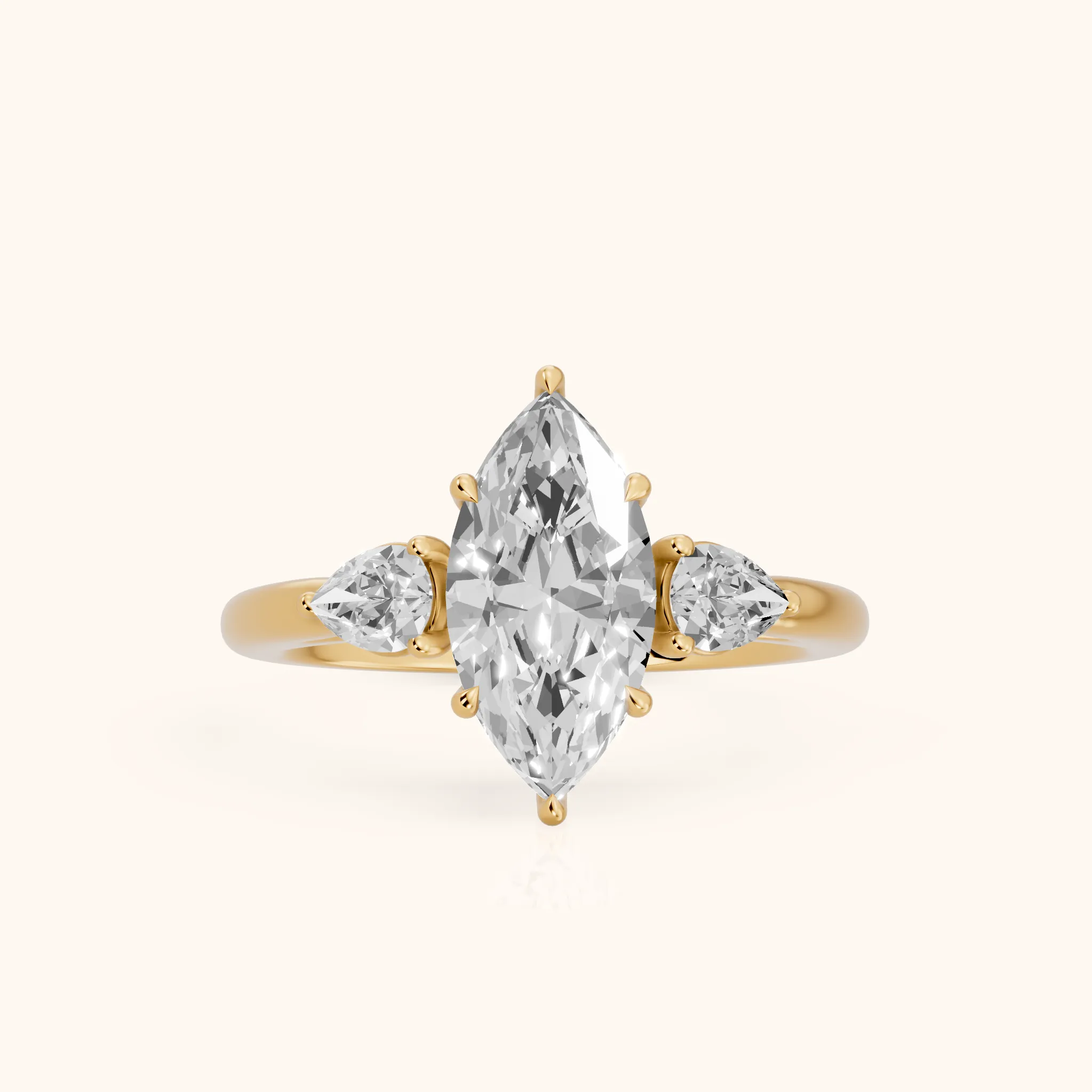 Phoebe Three-Stone Marquise Diamond Ring in Yellow Gold — view 1