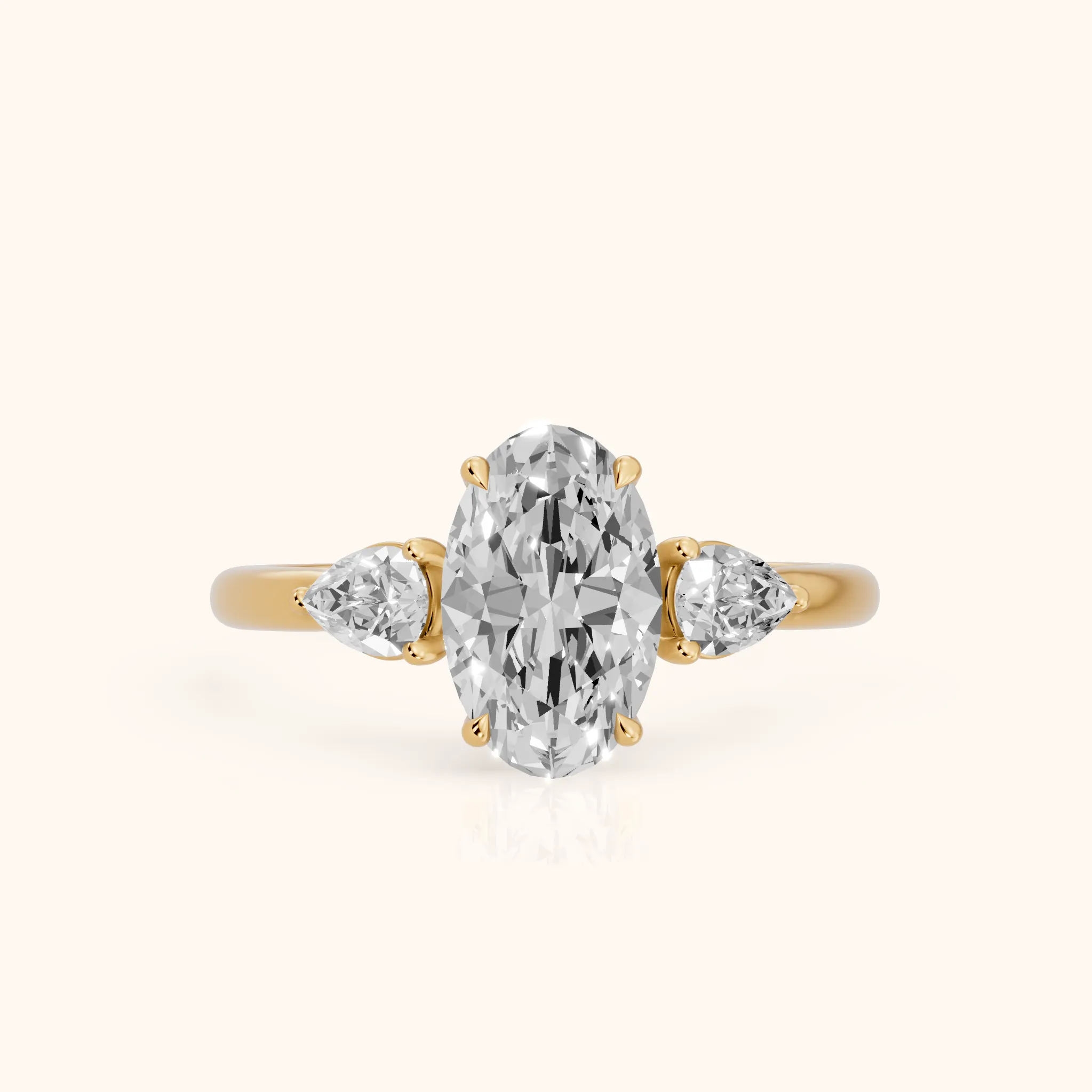 Phoebe Three-Stone Oval Diamond Ring in Yellow Gold — view 1