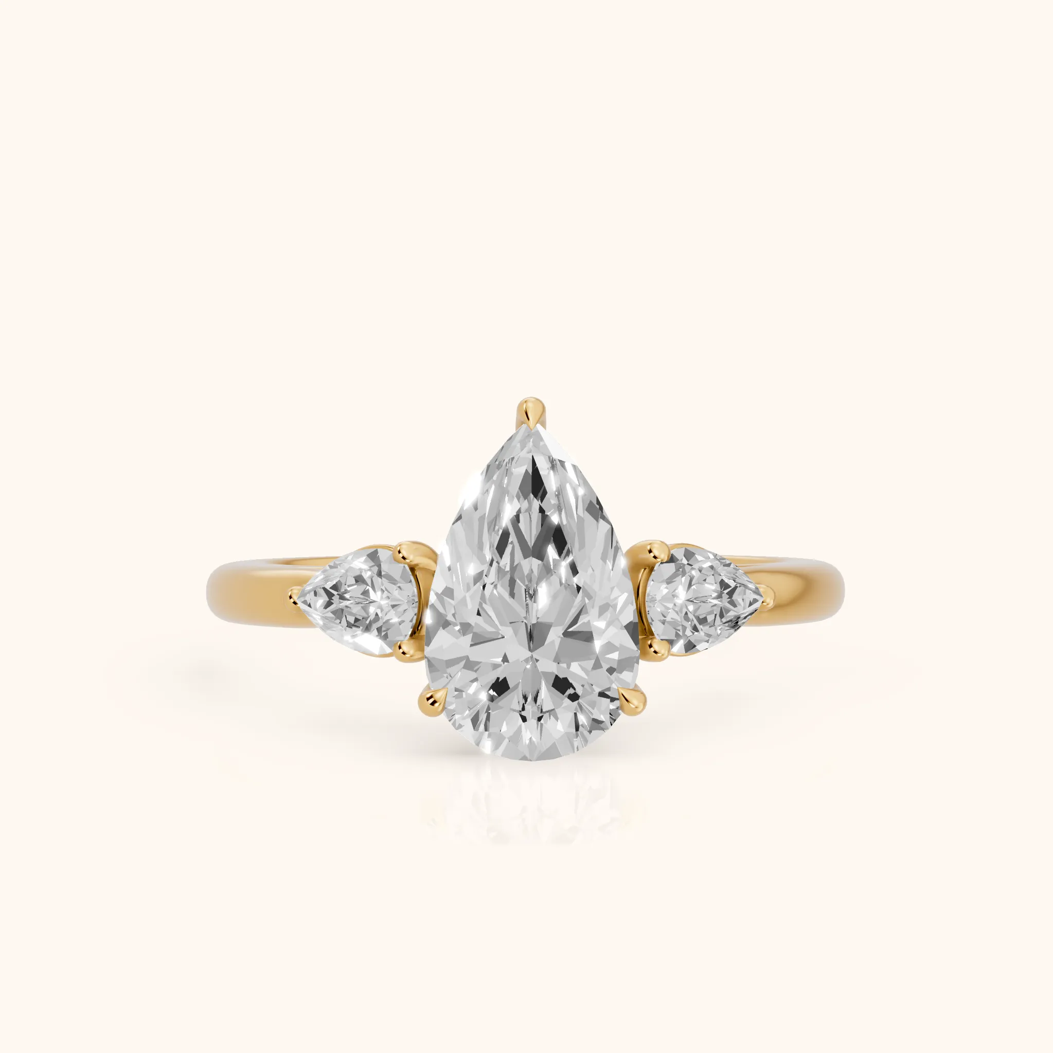 Phoebe Three-Stone Pear Diamond Ring in Yellow Gold — view 1