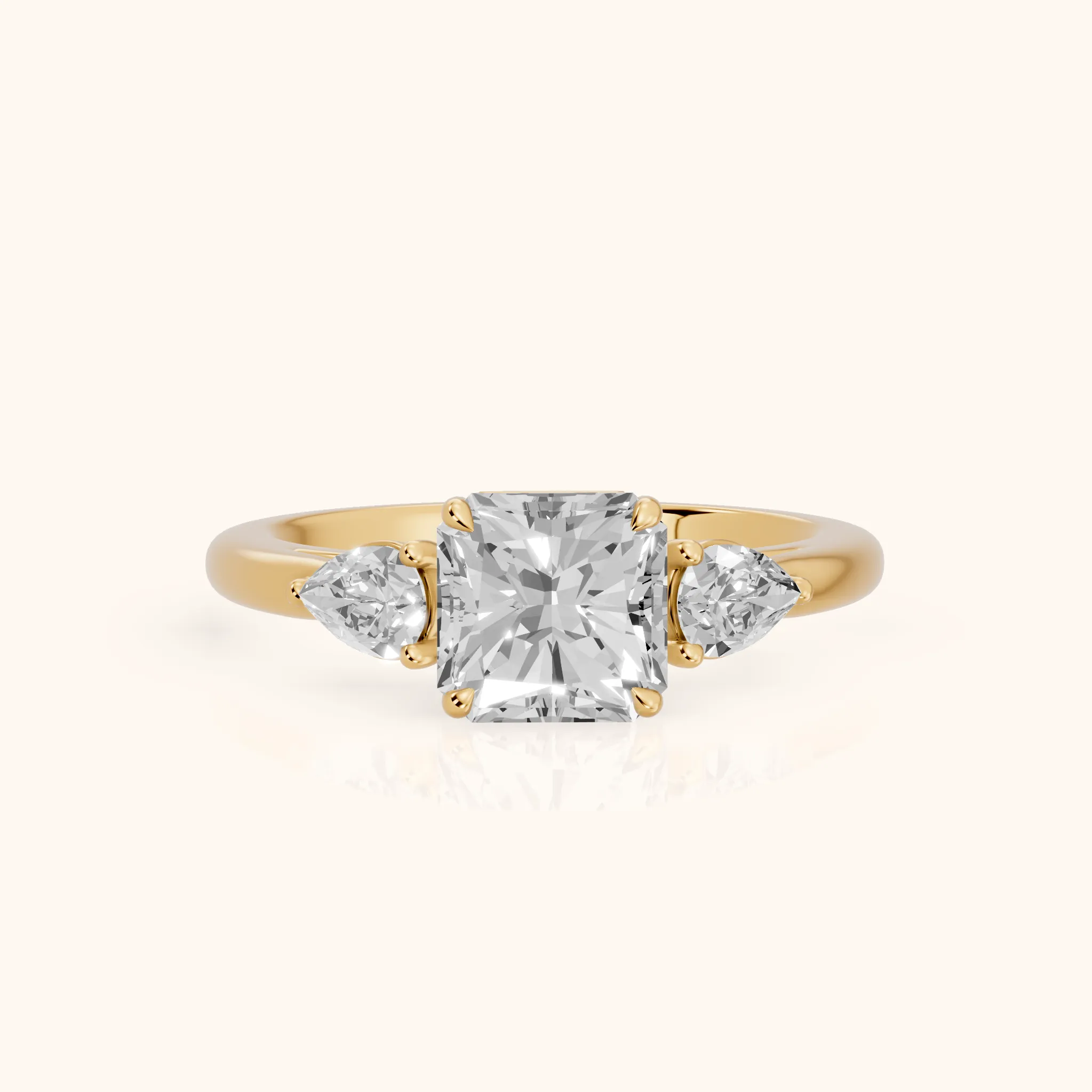 Phoebe Three-Stone Radiant Diamond Ring in Yellow Gold — view 1