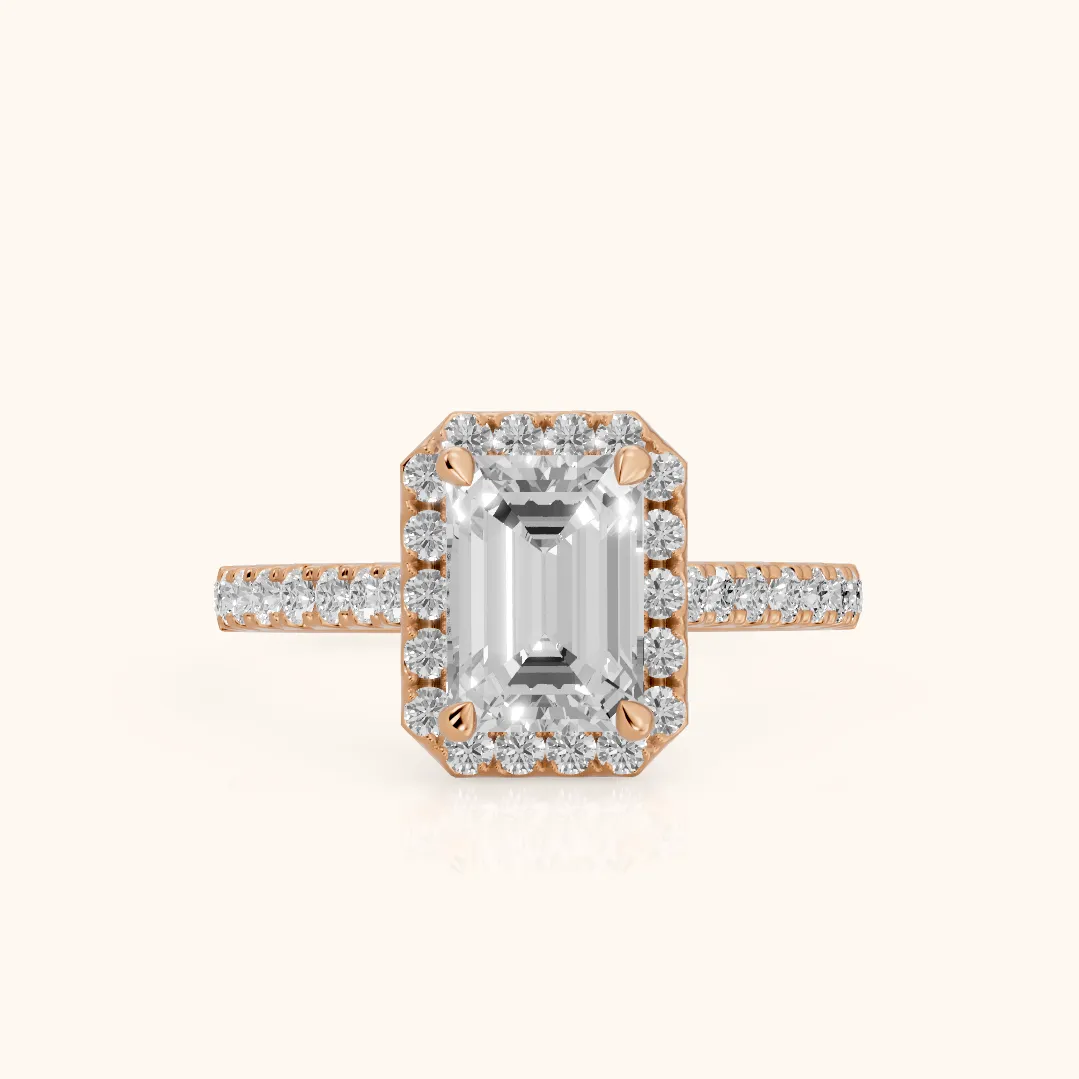 Amara Halo Claw Prong Emerald Diamond Ring in Rose Gold — view 2