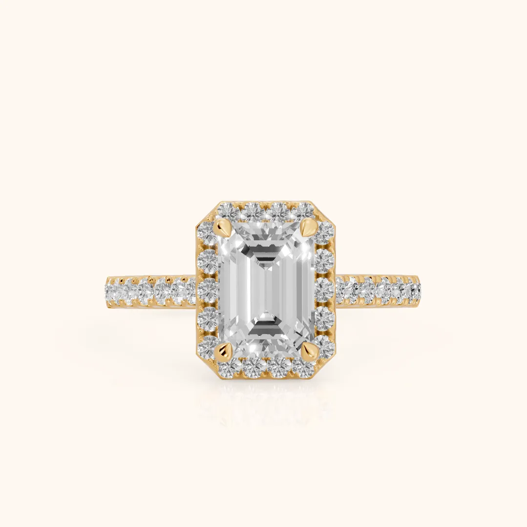 Amara Halo Claw Prong Emerald Diamond Ring in Yellow Gold — view 2