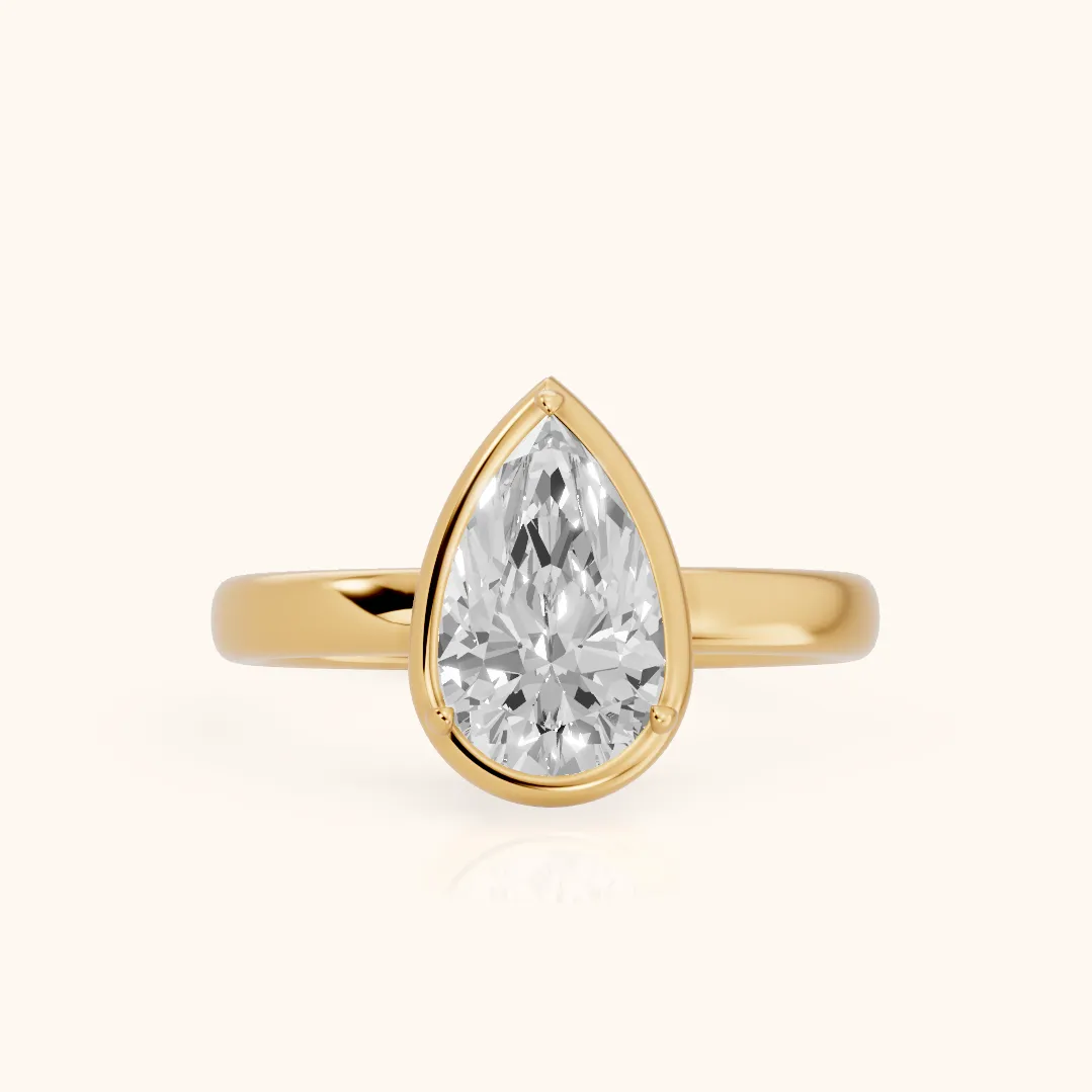 Alina Bezel Solitaire Pear Diamond Ring in Yellow Gold — view 2