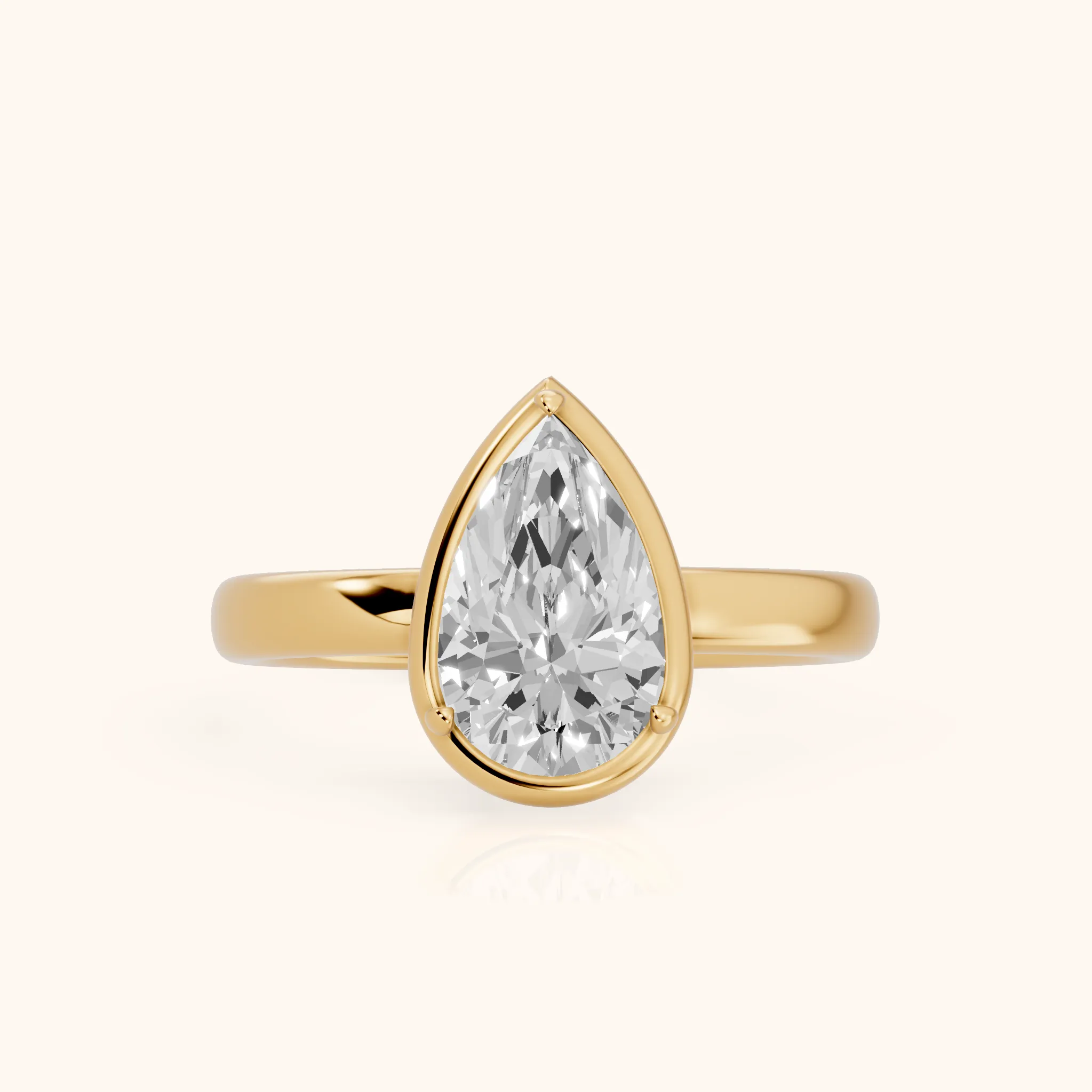Alina Bezel Solitaire Pear Diamond Ring in Yellow Gold — view 1