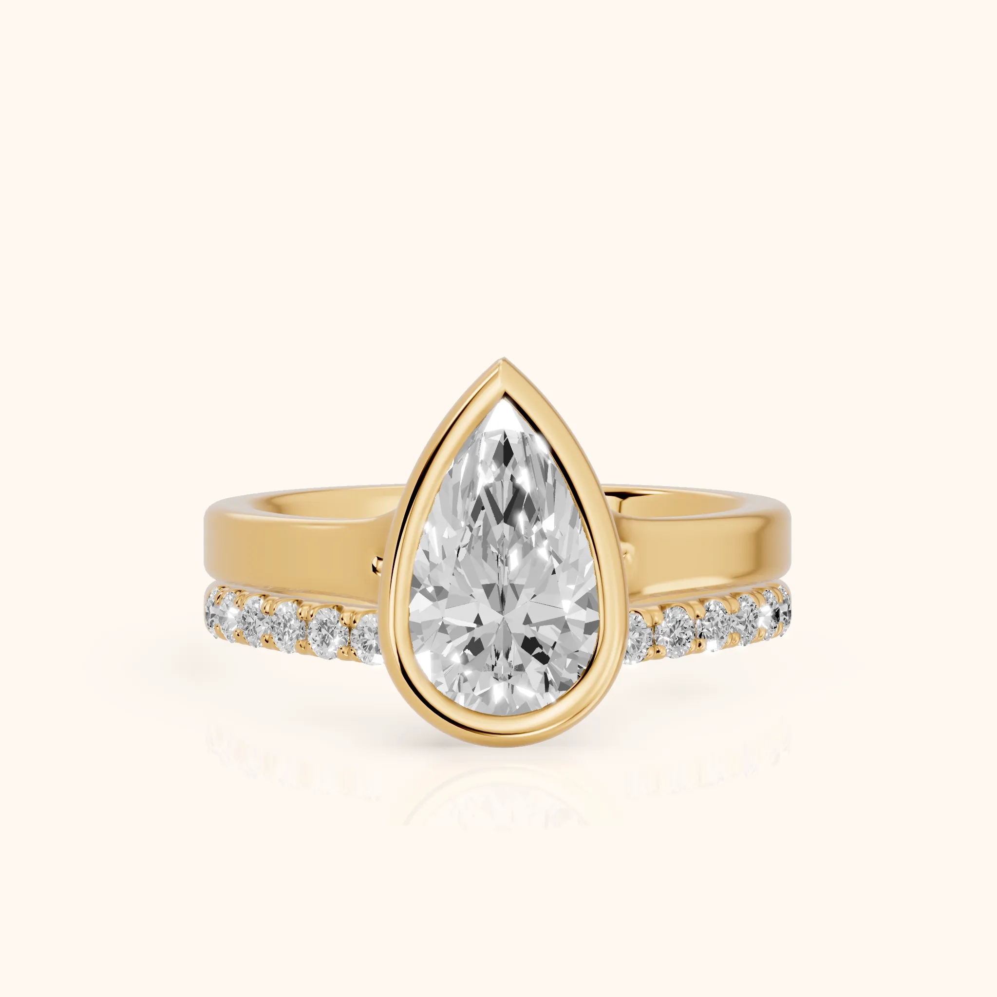 Ayla Bezel Bypass Pear Diamond Ring in Yellow Gold — view 1