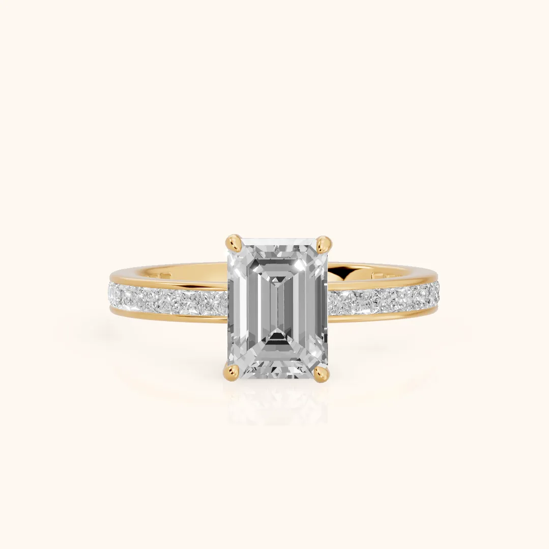 Brielle Channel Set Solitaire Emerald Diamond Ring in Yellow Gold — view 2