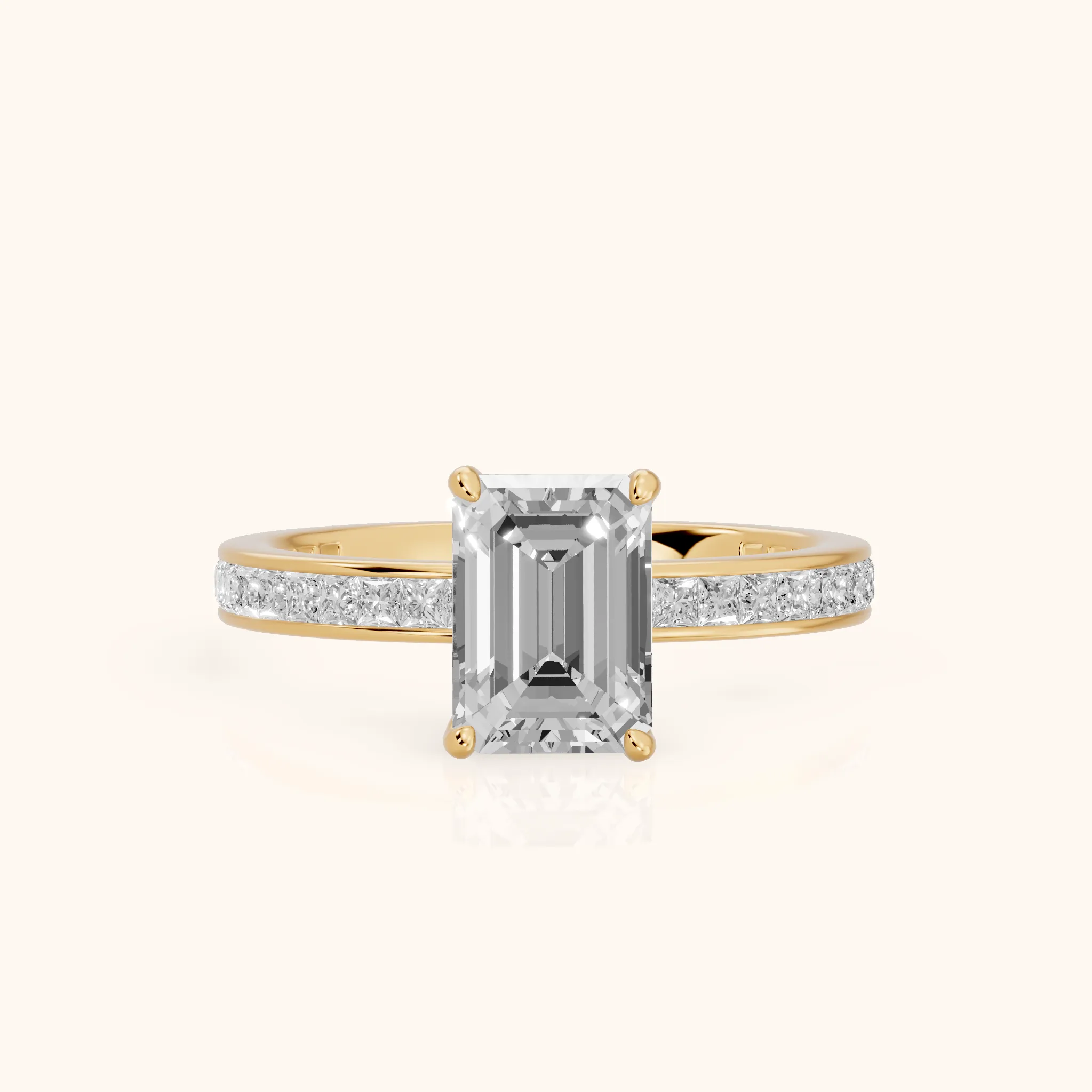 Brielle Channel Set Solitaire Emerald Diamond Ring in Yellow Gold — view 1