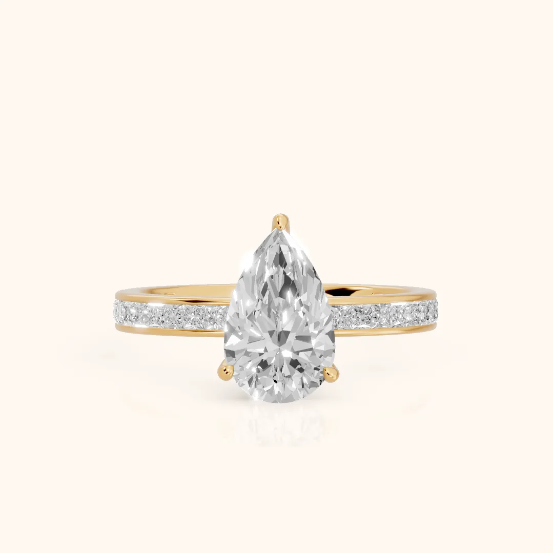 Brielle Channel Set Solitaire Pear Diamond Ring in Yellow Gold — view 2