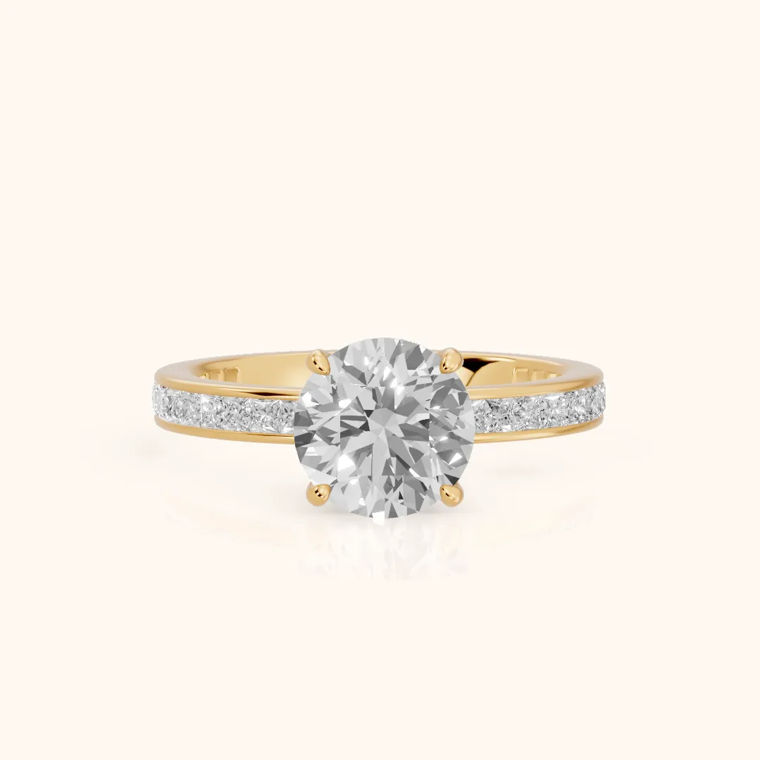 Brielle Channel Set Solitaire Round Diamond Ring in Yellow Gold — view 2