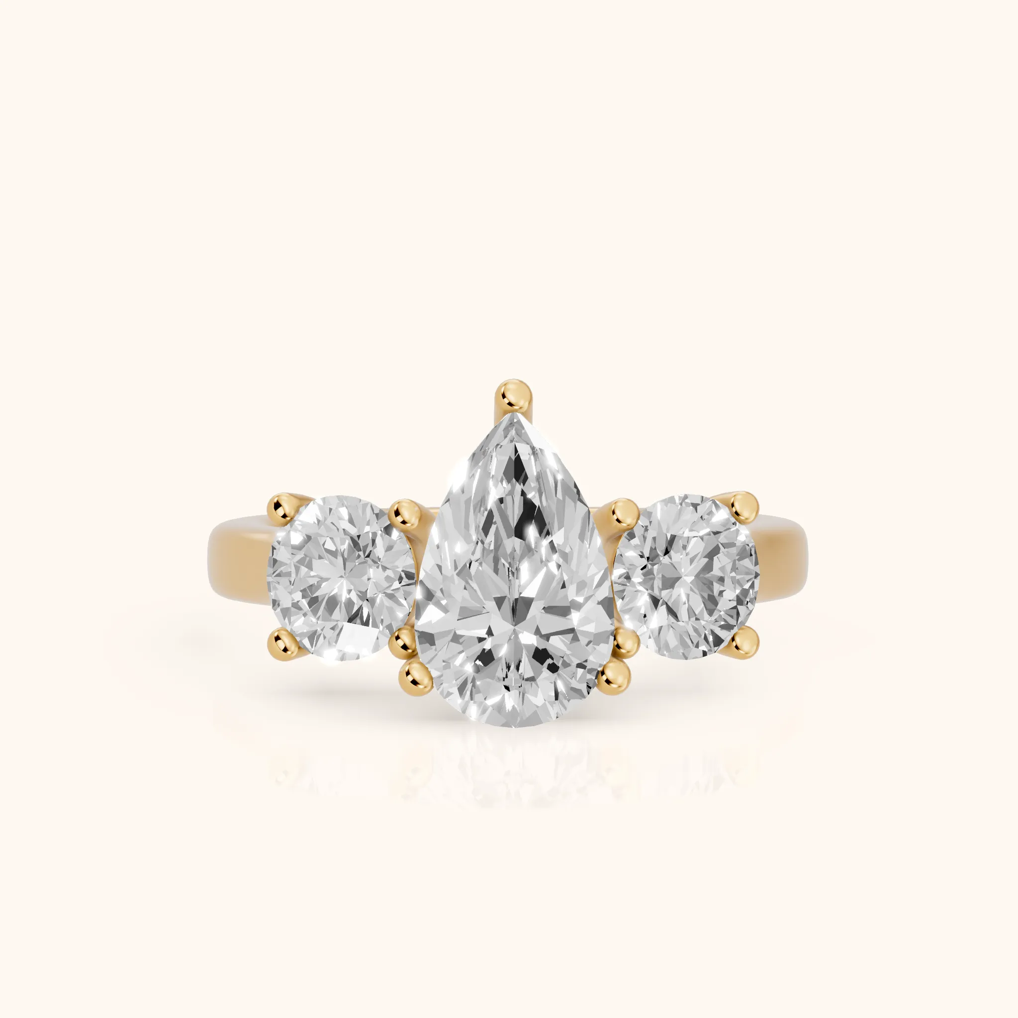 Callie Three-Stone Trellis Pear Diamond Engagement Ring in Yellow Gold — view 1