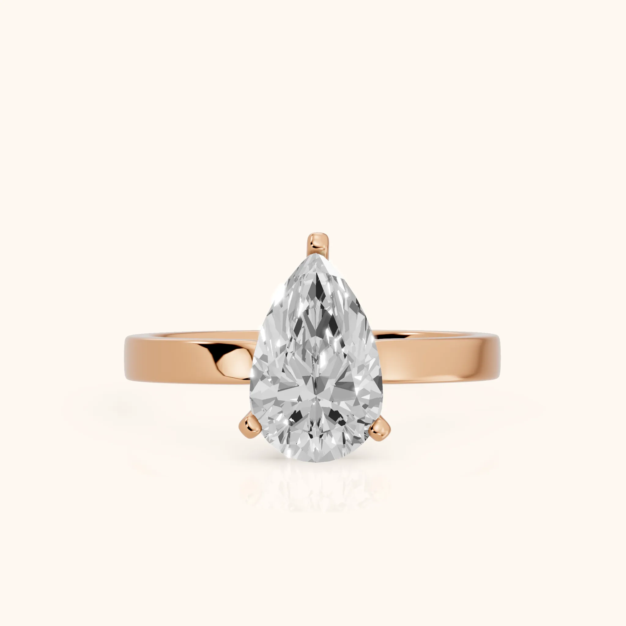 Delia Solitaire Pear Diamond Engagement Ring in Rose Gold — view 1