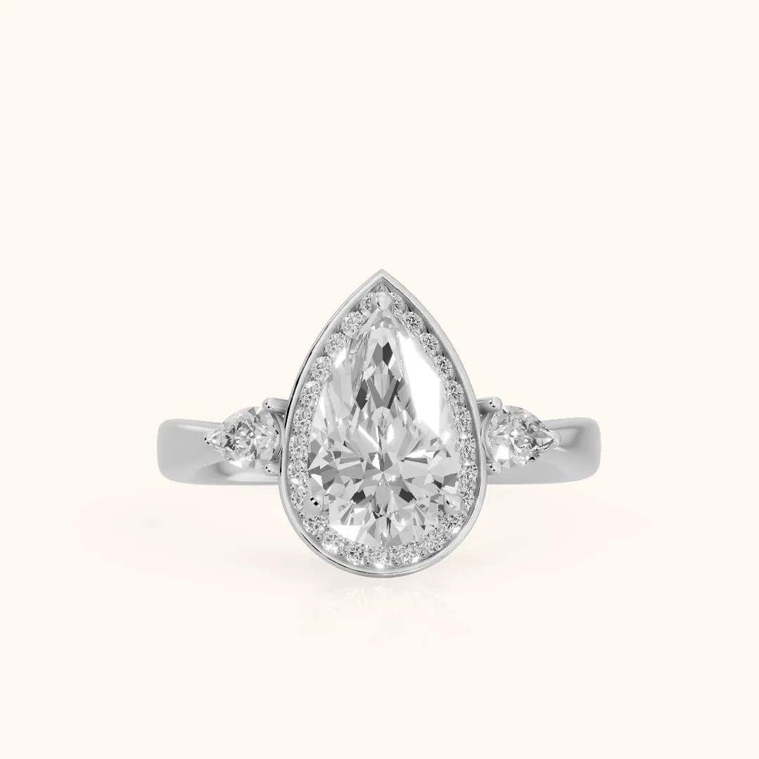 Eliza Halo Sidestone Pear Diamond Engagement Ring in Silver — view 2