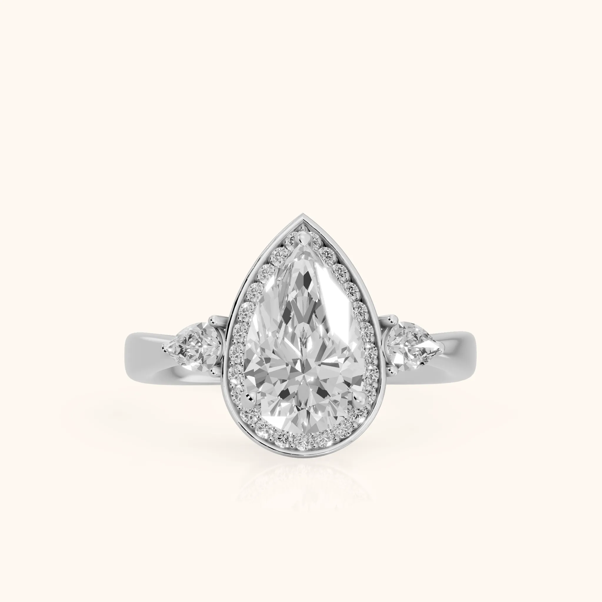 Eliza Halo Sidestone Pear Diamond Engagement Ring in Silver — view 1