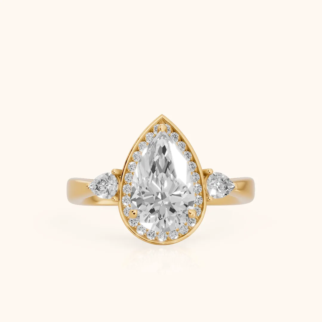 Eliza Halo Sidestone Pear Diamond Engagement Ring in Yellow Gold — view 2