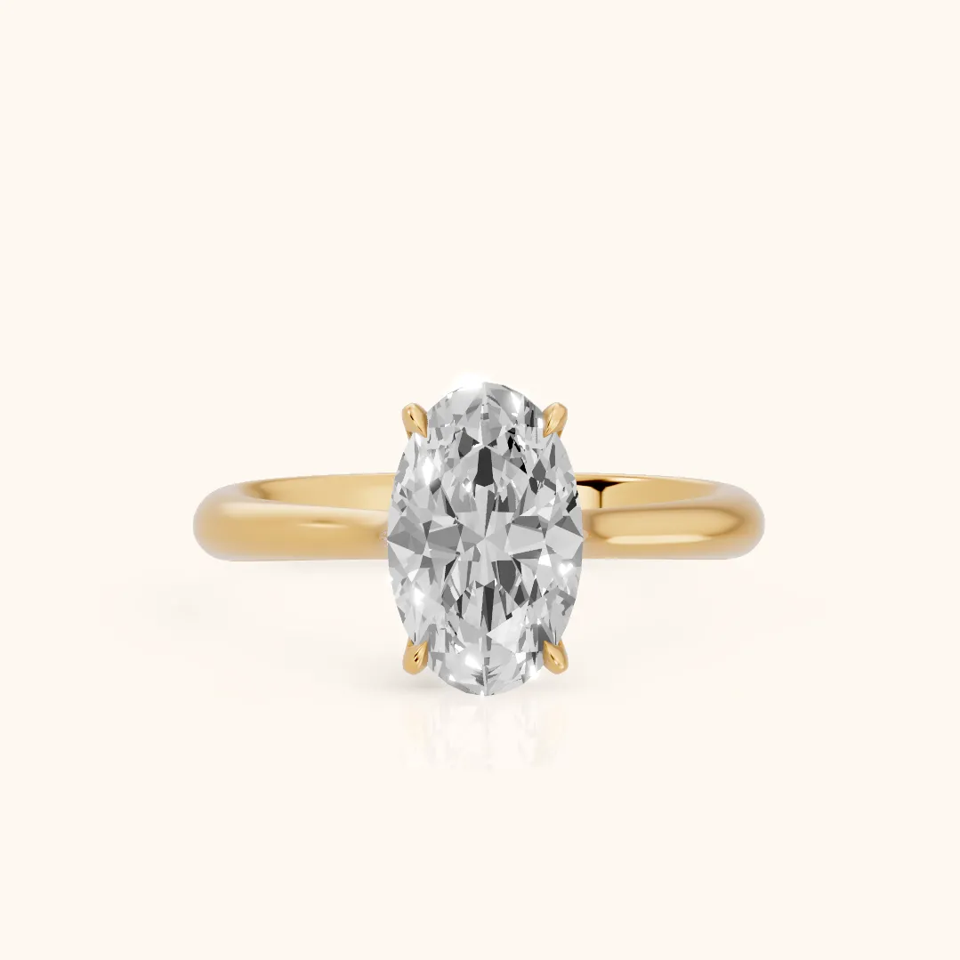 Evie Solitaire Six-Prong Oval Diamond Engagement Ring in Yellow Gold — view 2