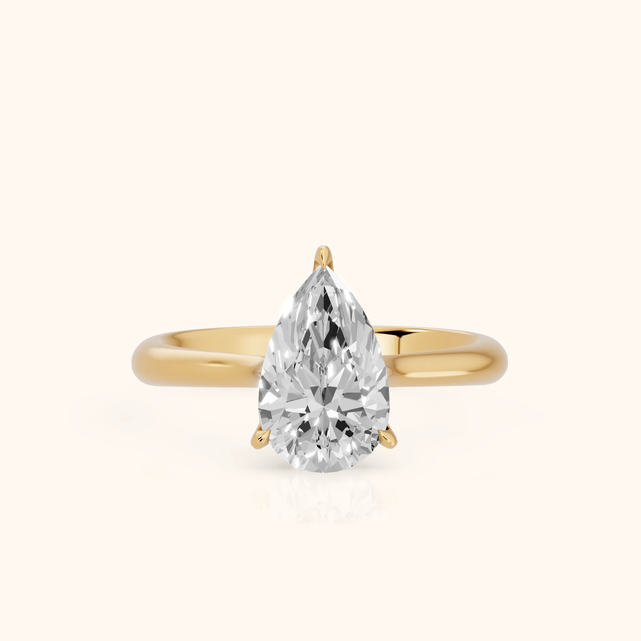 Evie Solitaire Six-Prong Pear Diamond Engagement Ring in Yellow Gold — view 1