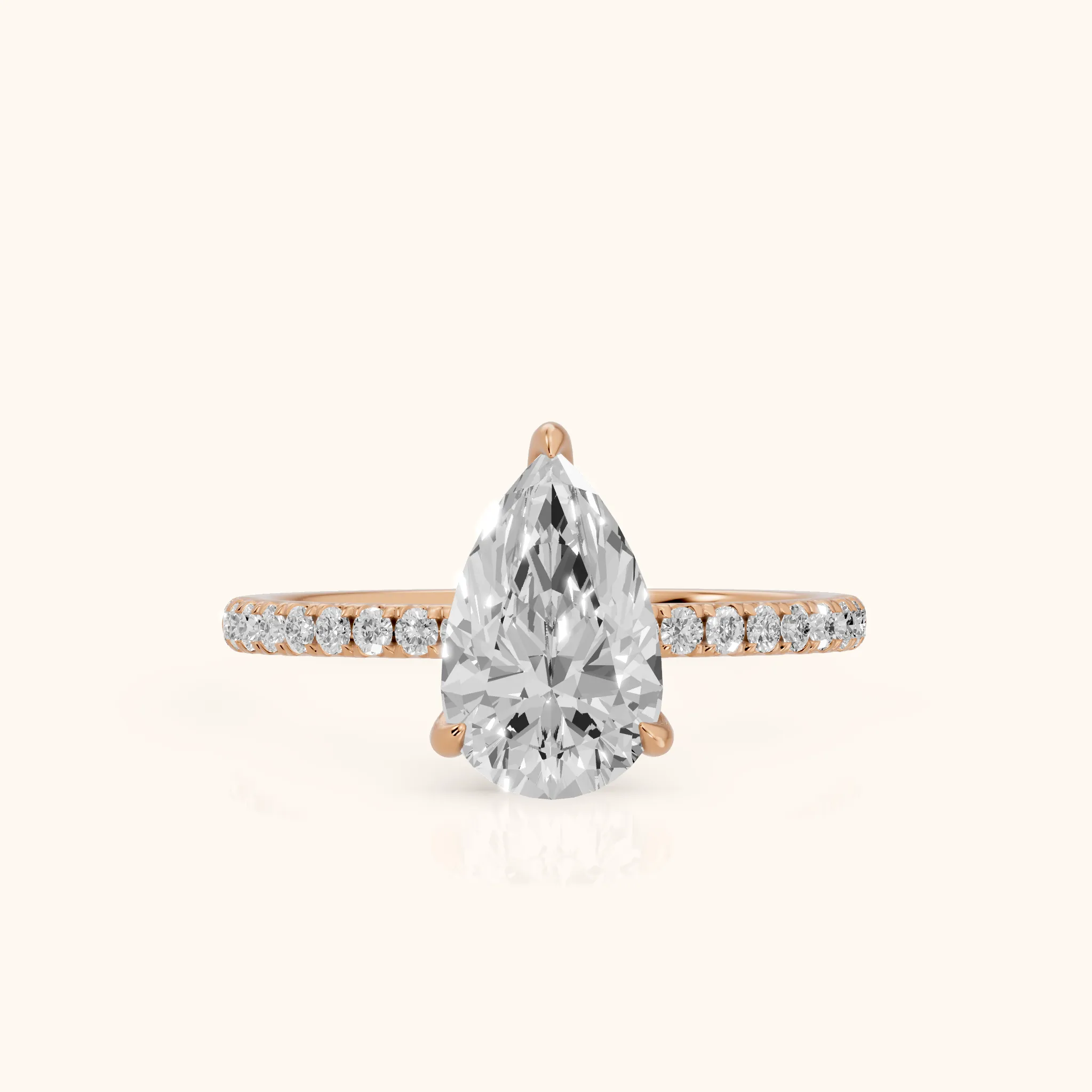 Ione Solitaire Pavé Pear Diamond Engagement Ring in Rose Gold — view 1