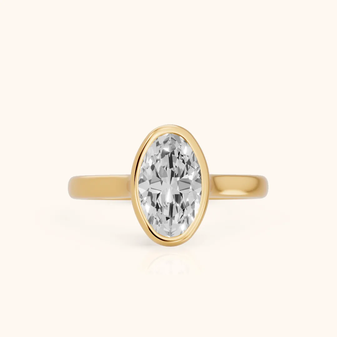 Jolie Bezel Solitaire Oval Diamond Engagement Ring in Yellow Gold — view 2