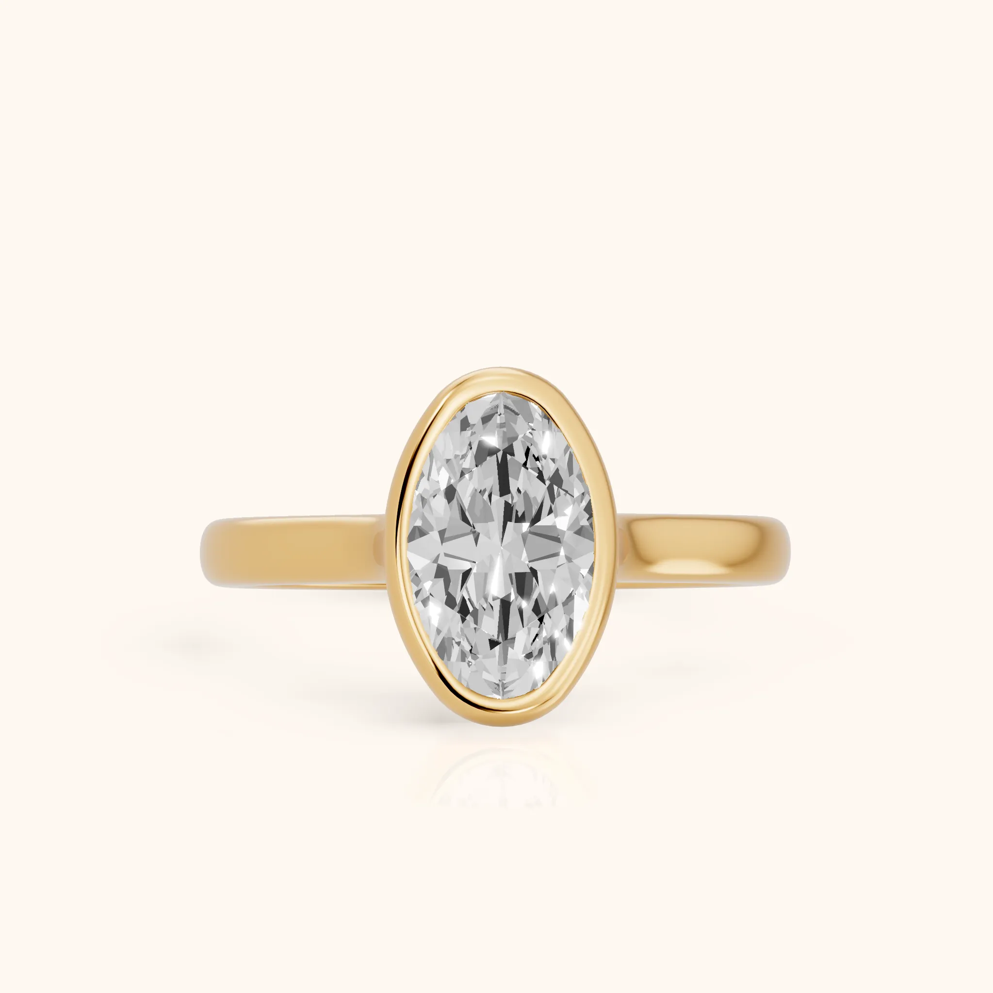 Jolie Bezel Solitaire Oval Diamond Engagement Ring in Yellow Gold — view 1
