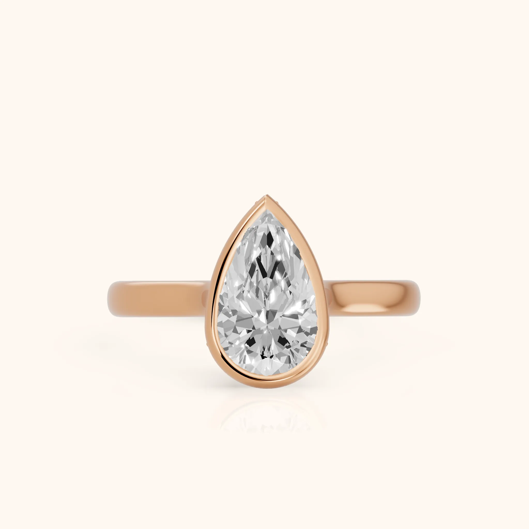 Jolie Bezel Solitaire Pear Diamond Engagement Ring in Rose Gold — view 1