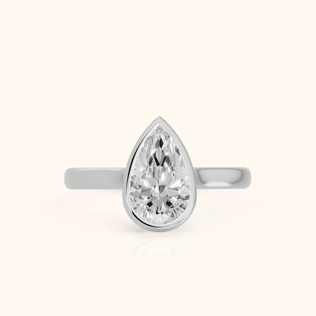 Jolie Bezel Solitaire Pear Diamond Engagement Ring in Platinum — view 2