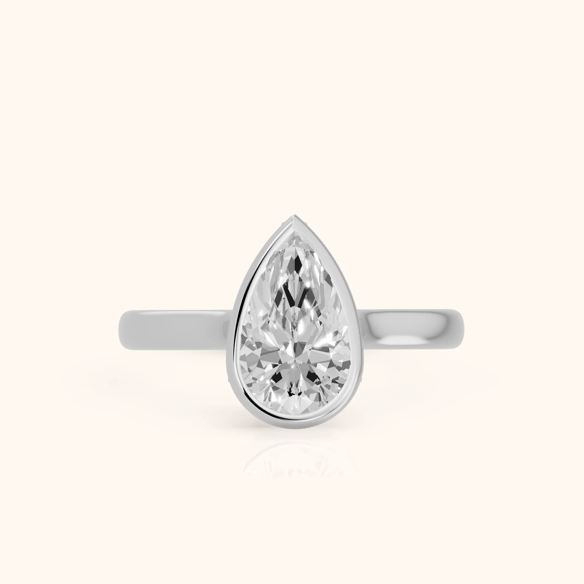 Jolie Bezel Solitaire Pear Diamond Engagement Ring in Platinum — view 1