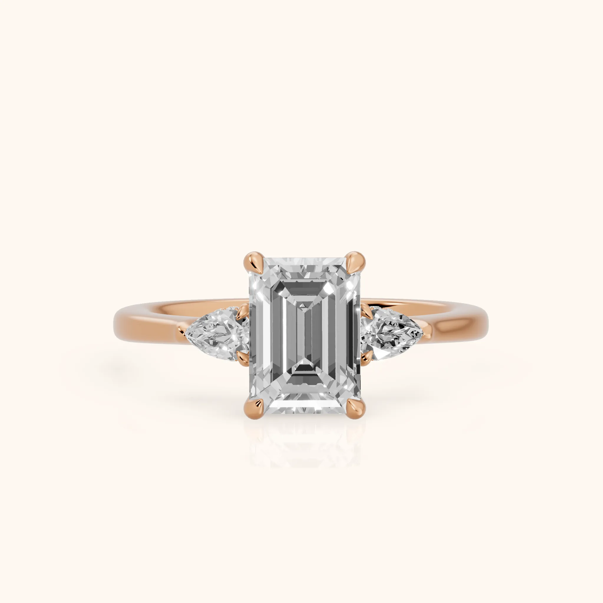 Leila Three-Stone Emerald Diamond Engagement Ring in Rose Gold — view 1