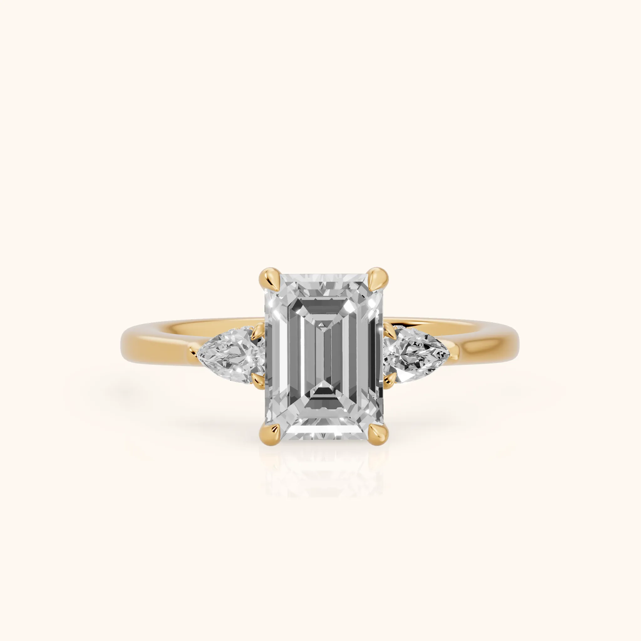 Leila Three-Stone Emerald Diamond Engagement Ring in Yellow Gold — view 1
