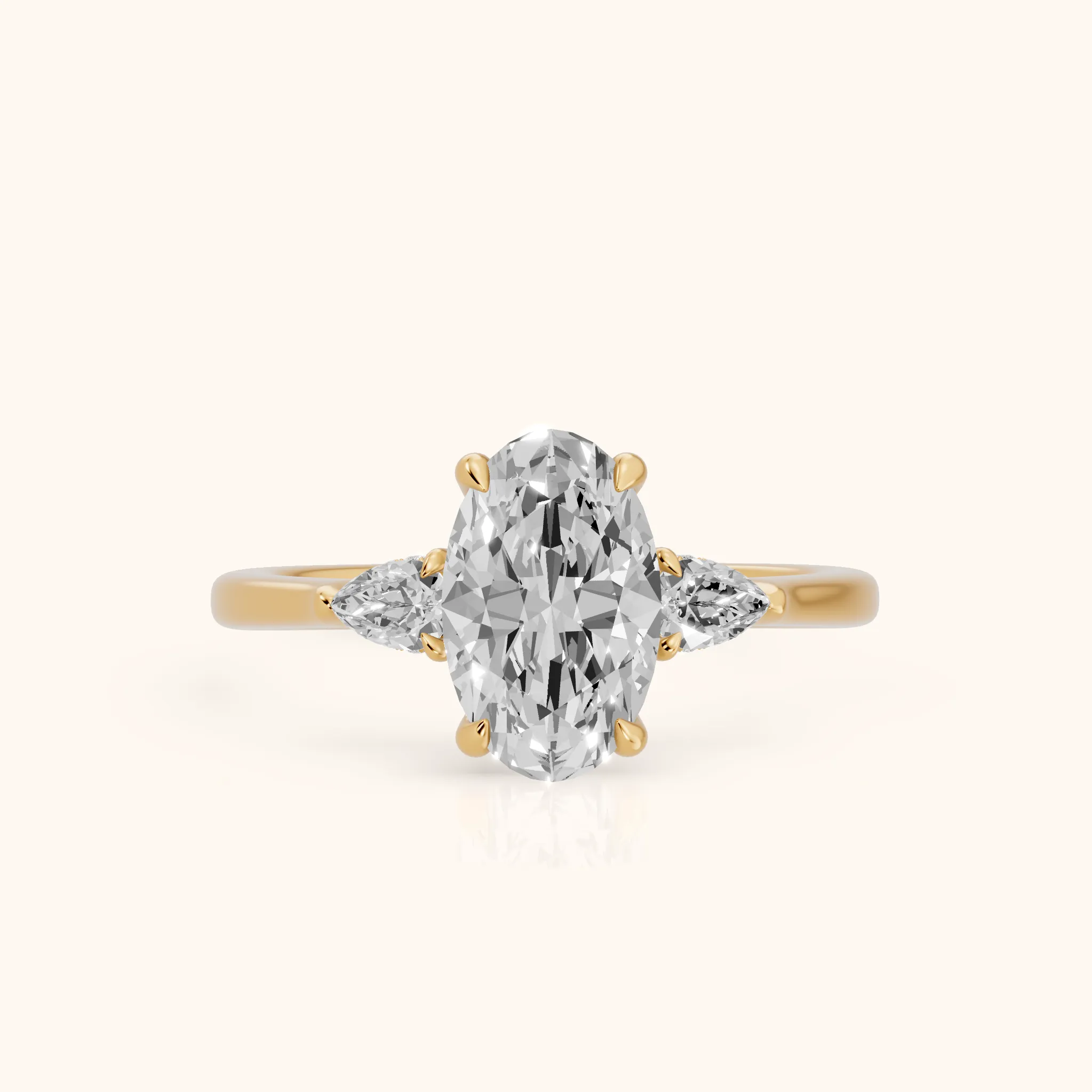 Leila Three-Stone Oval Diamond Engagement Ring in Yellow Gold — view 1