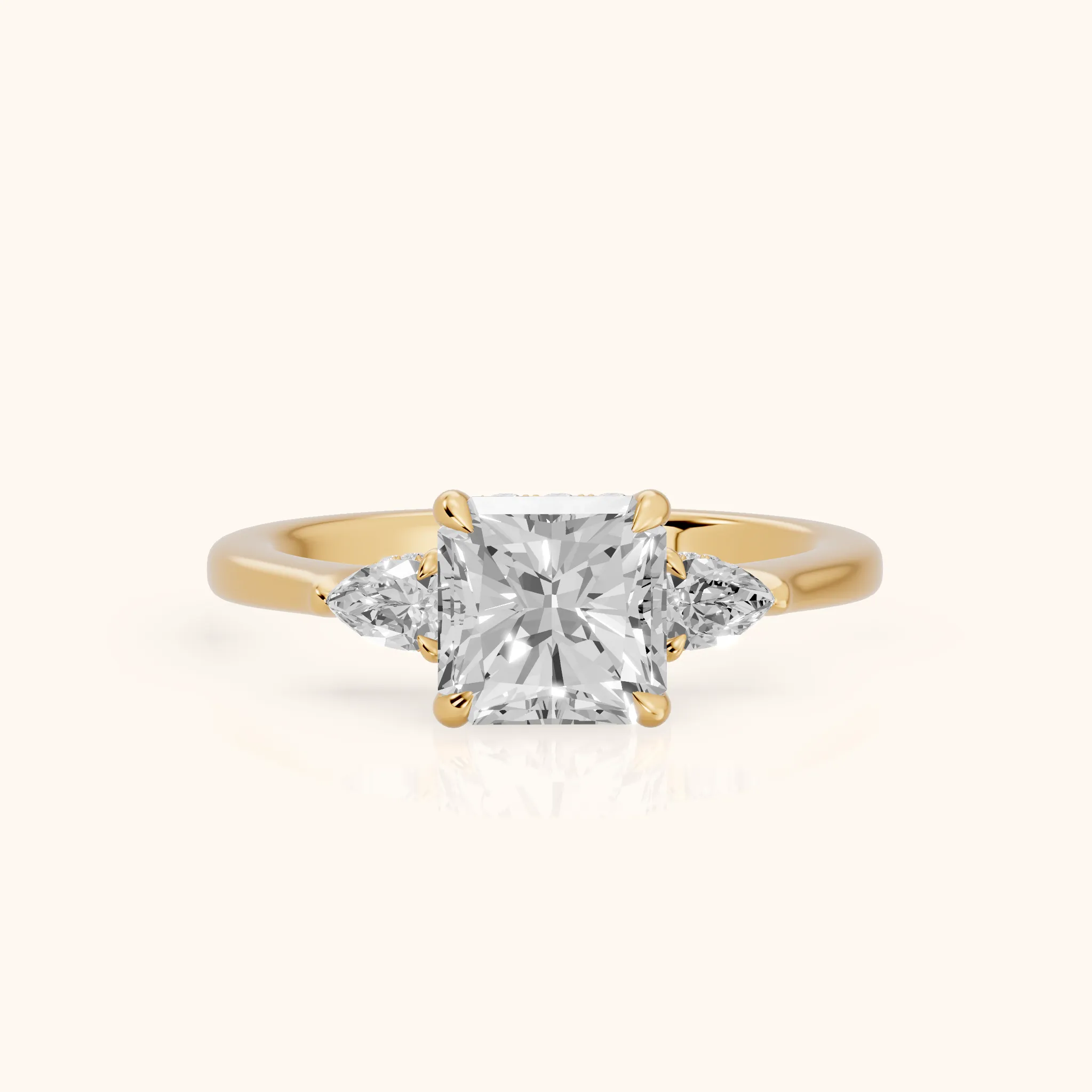 Leila Three-Stone Radiant Diamond Engagement Ring in Yellow Gold — view 1