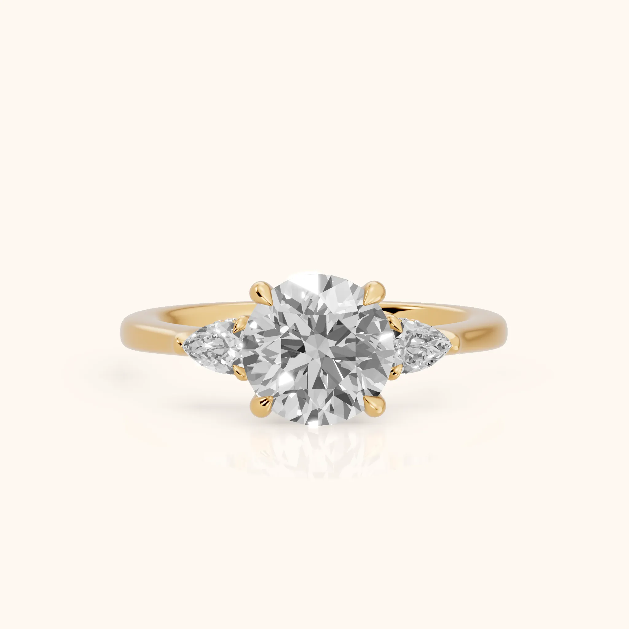 Leila Three-Stone Round Diamond Engagement Ring in Yellow Gold — view 1