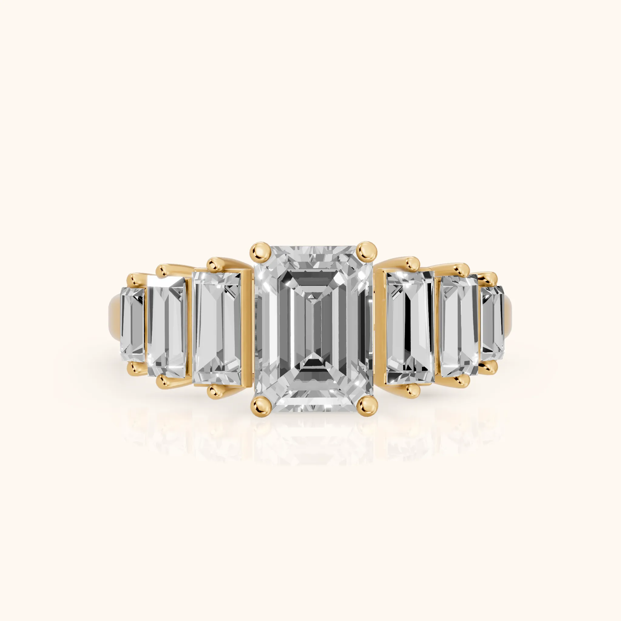 Mara Sidestone Baguette Accent Emerald Diamond Engagement Ring in Yellow Gold — view 1