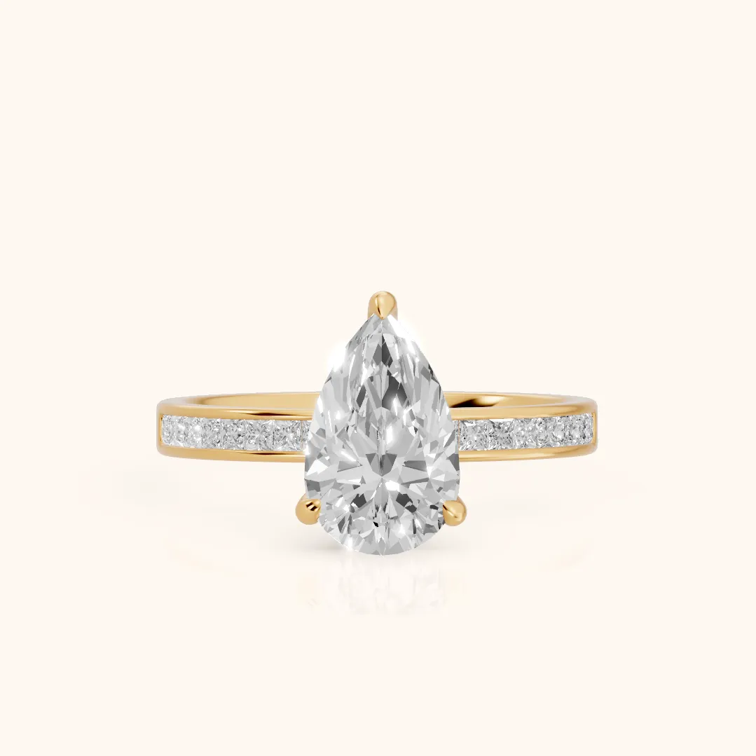 Maren Sidestone Channel Set Pear Diamond Engagement Ring in Yellow Gold — view 2