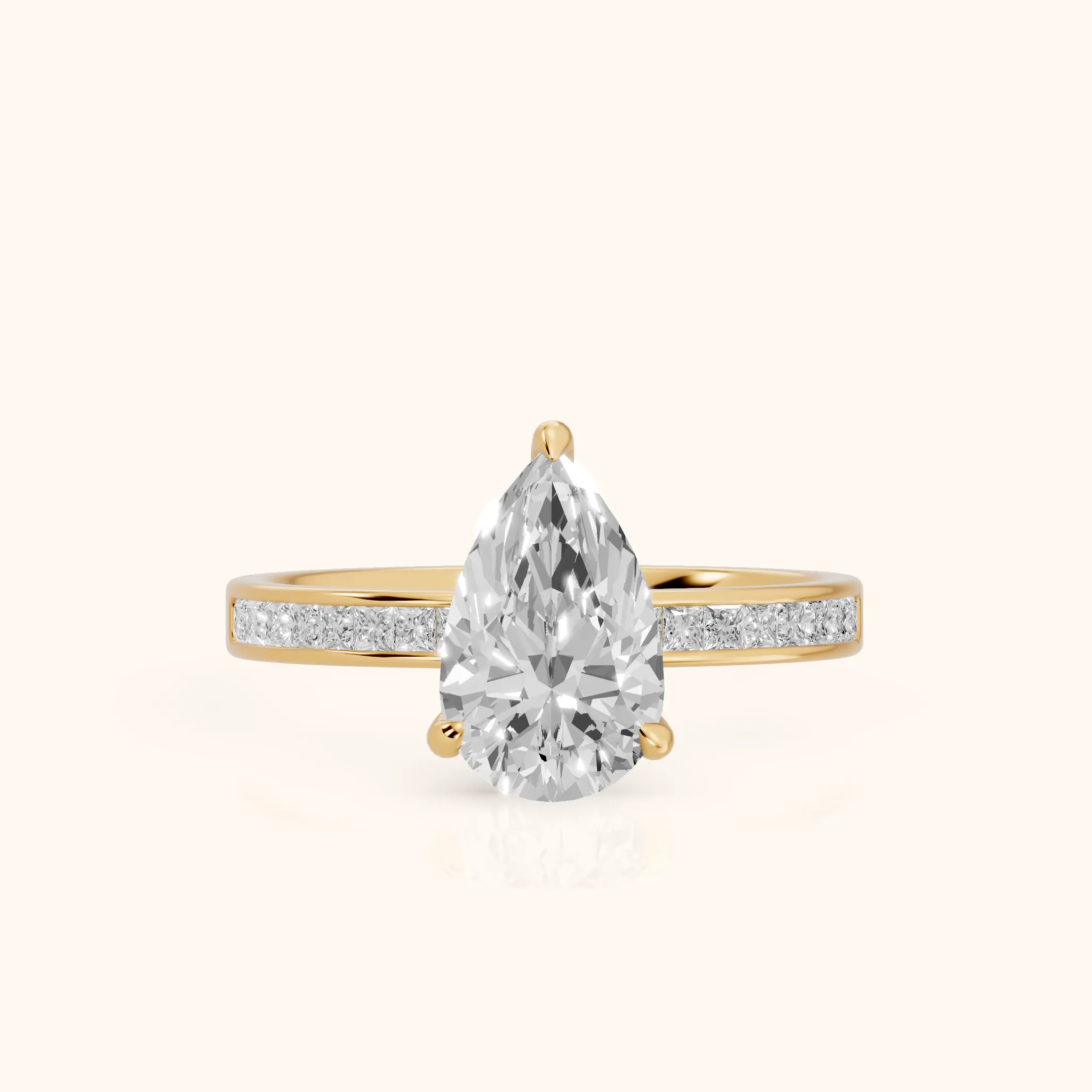 Maren Sidestone Channel Set Pear Diamond Engagement Ring in Yellow Gold — view 1