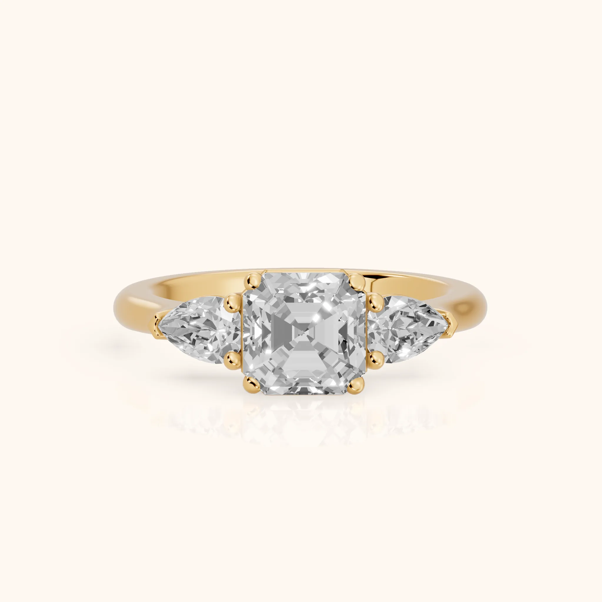 Mirabel Three-Stone Asscher Diamond Engagement Ring in Yellow Gold — view 1