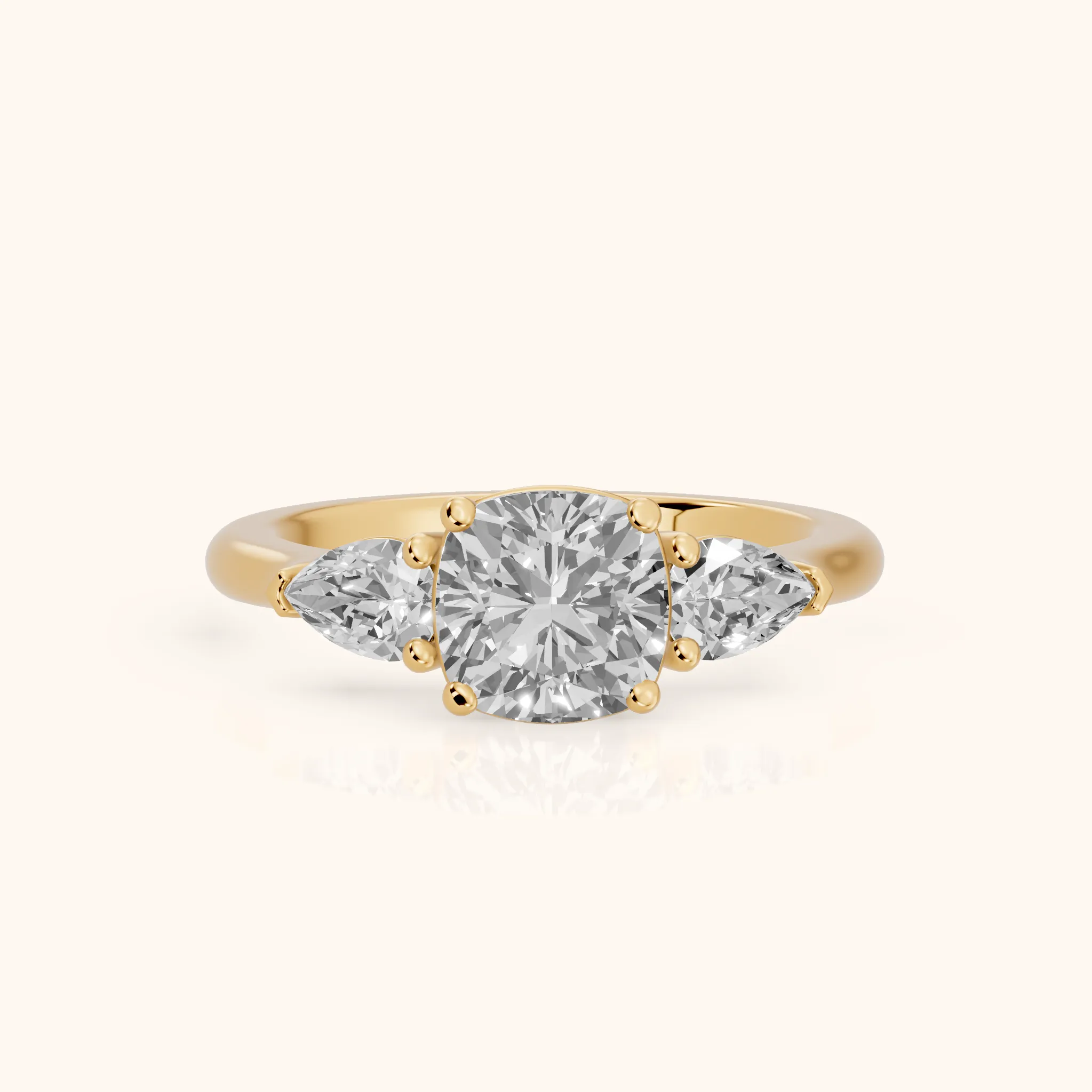 Mirabel Three-Stone Cushion Diamond Engagement Ring in Yellow Gold — view 1