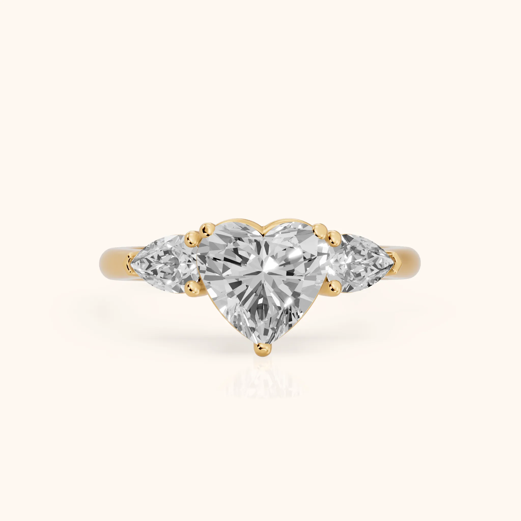 Mirabel Three-Stone Heart Diamond Engagement Ring in Yellow Gold — view 1