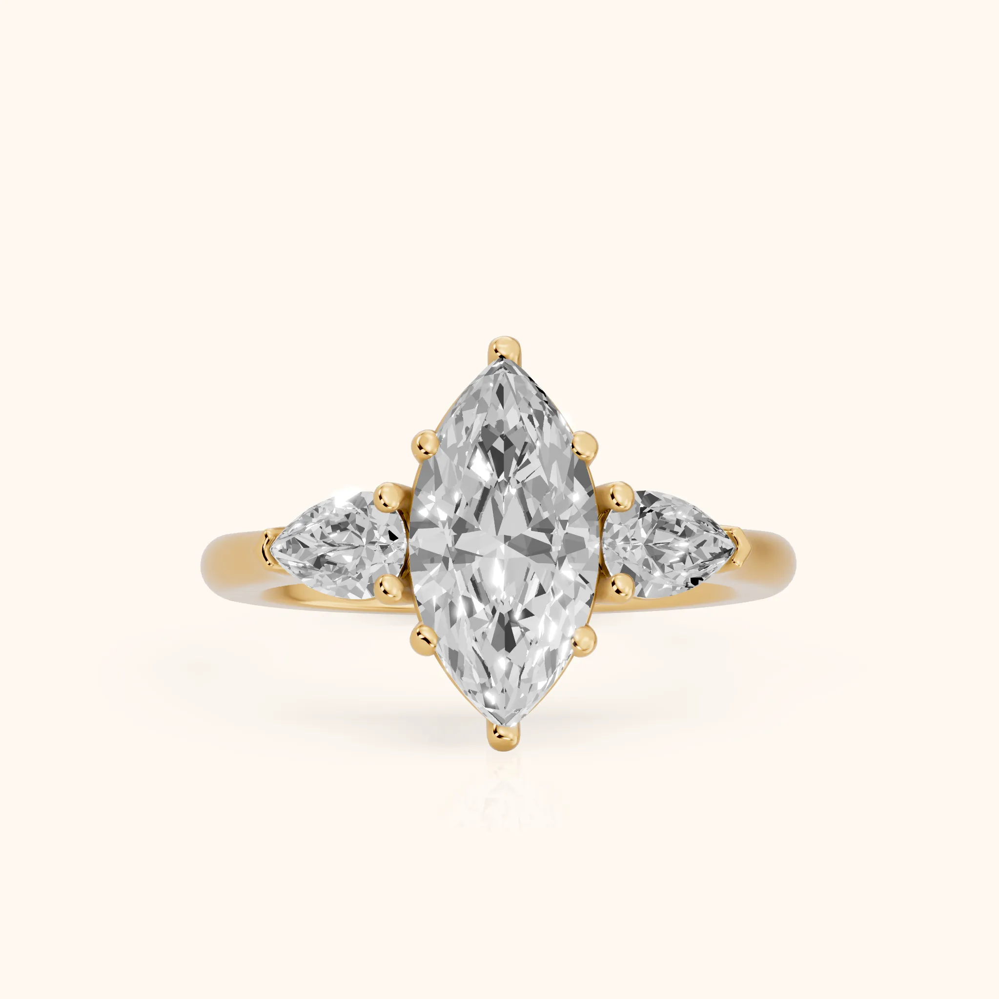 Mirabel Three-Stone Marquise Diamond Engagement Ring in Yellow Gold — view 1