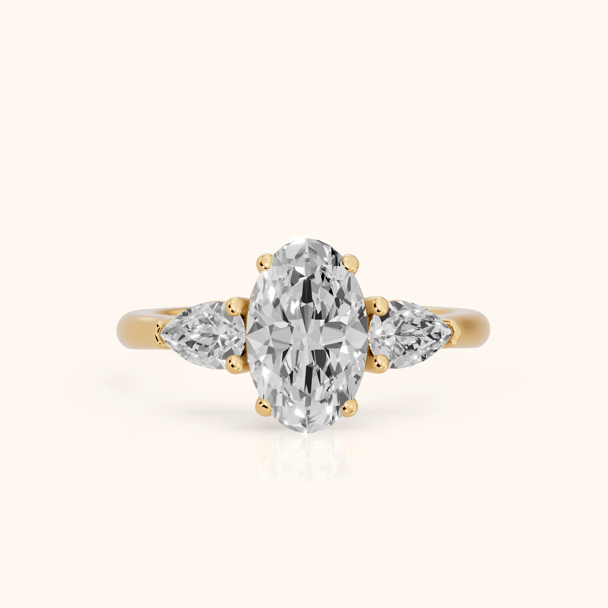 Mirabel Three-Stone Oval Diamond Engagement Ring in Yellow Gold — view 1