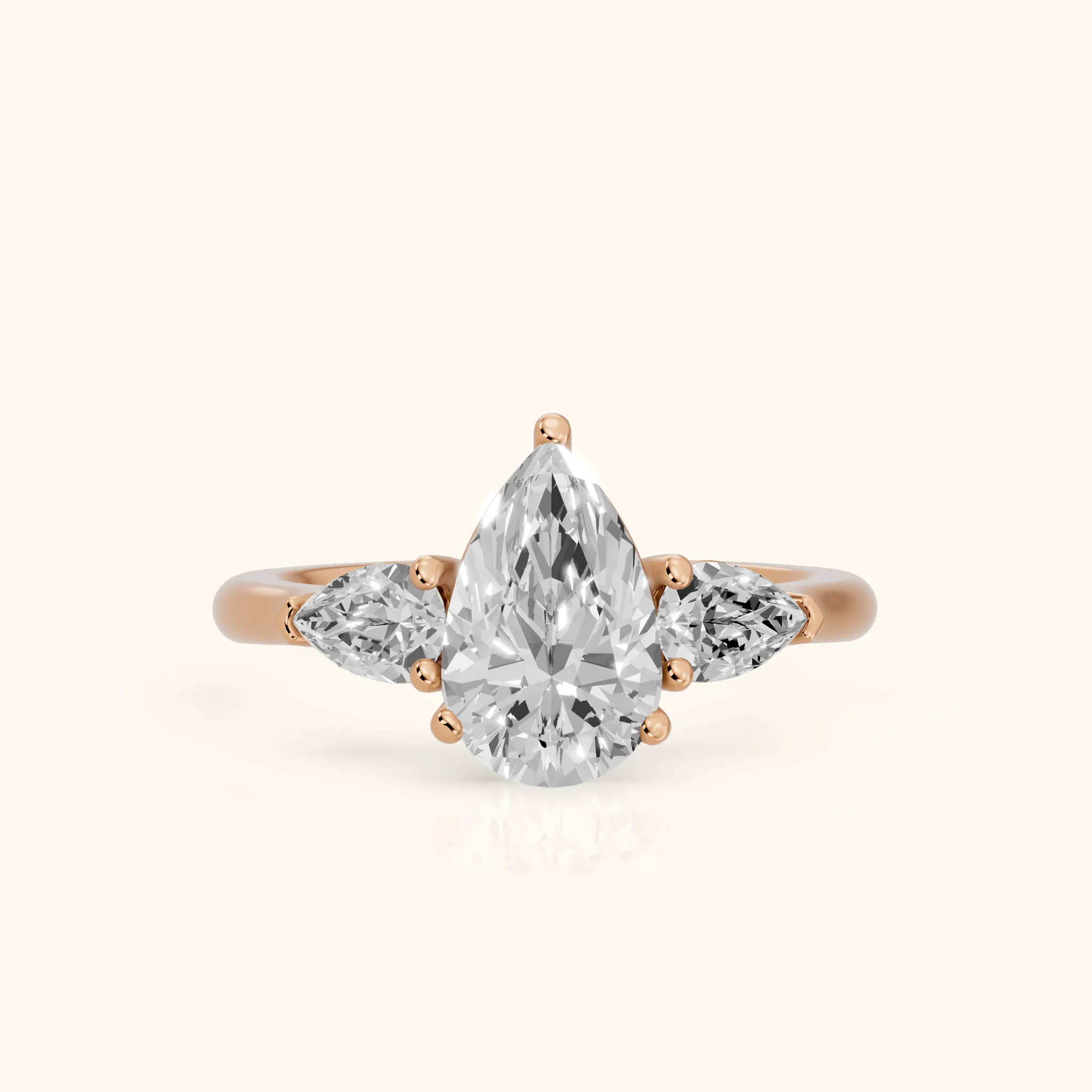 Mirabel Three-Stone Pear Diamond Engagement Ring in Rose Gold — view 1