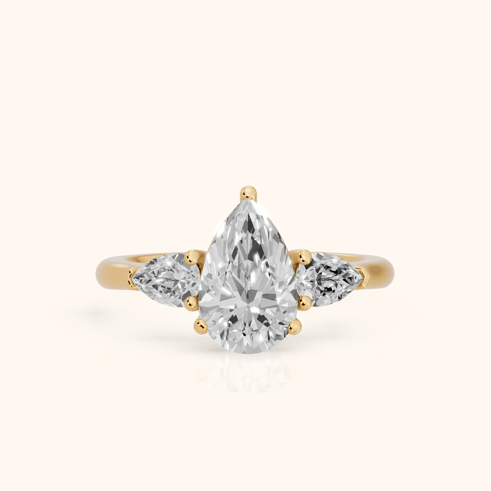 Mirabel Three-Stone Pear Diamond Engagement Ring in Yellow Gold — view 1