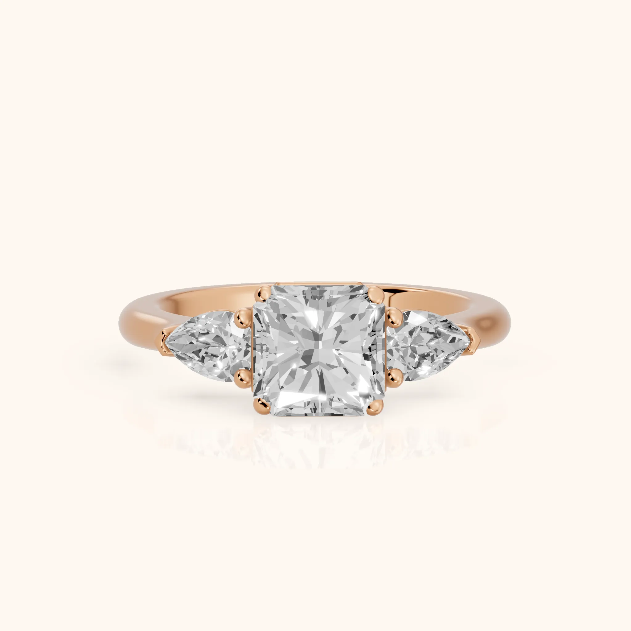 Mirabel Three-Stone Radiant Diamond Engagement Ring in Rose Gold — view 1