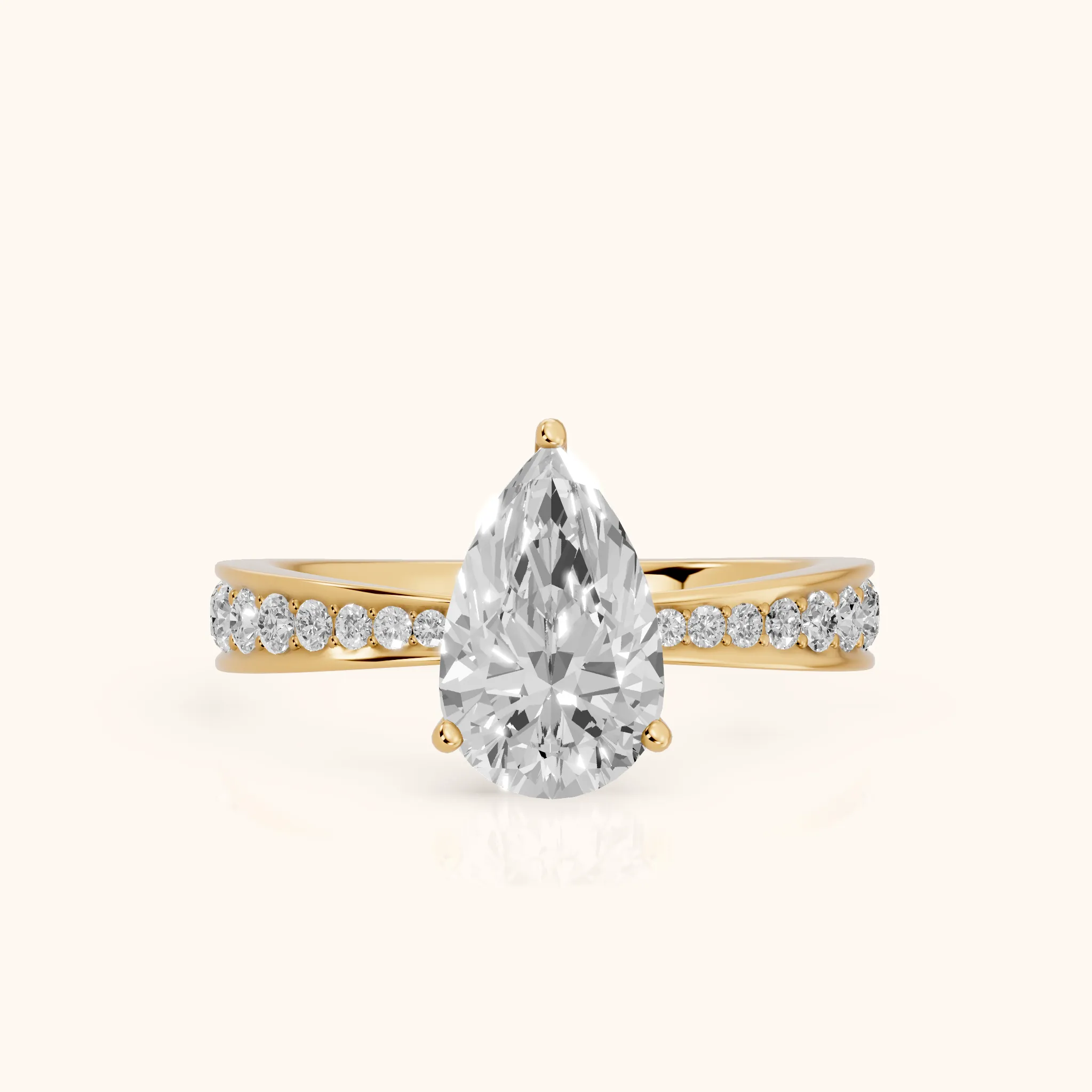 Rhea Sidestone Pavé Pear Diamond Engagement Ring in Yellow Gold — view 1