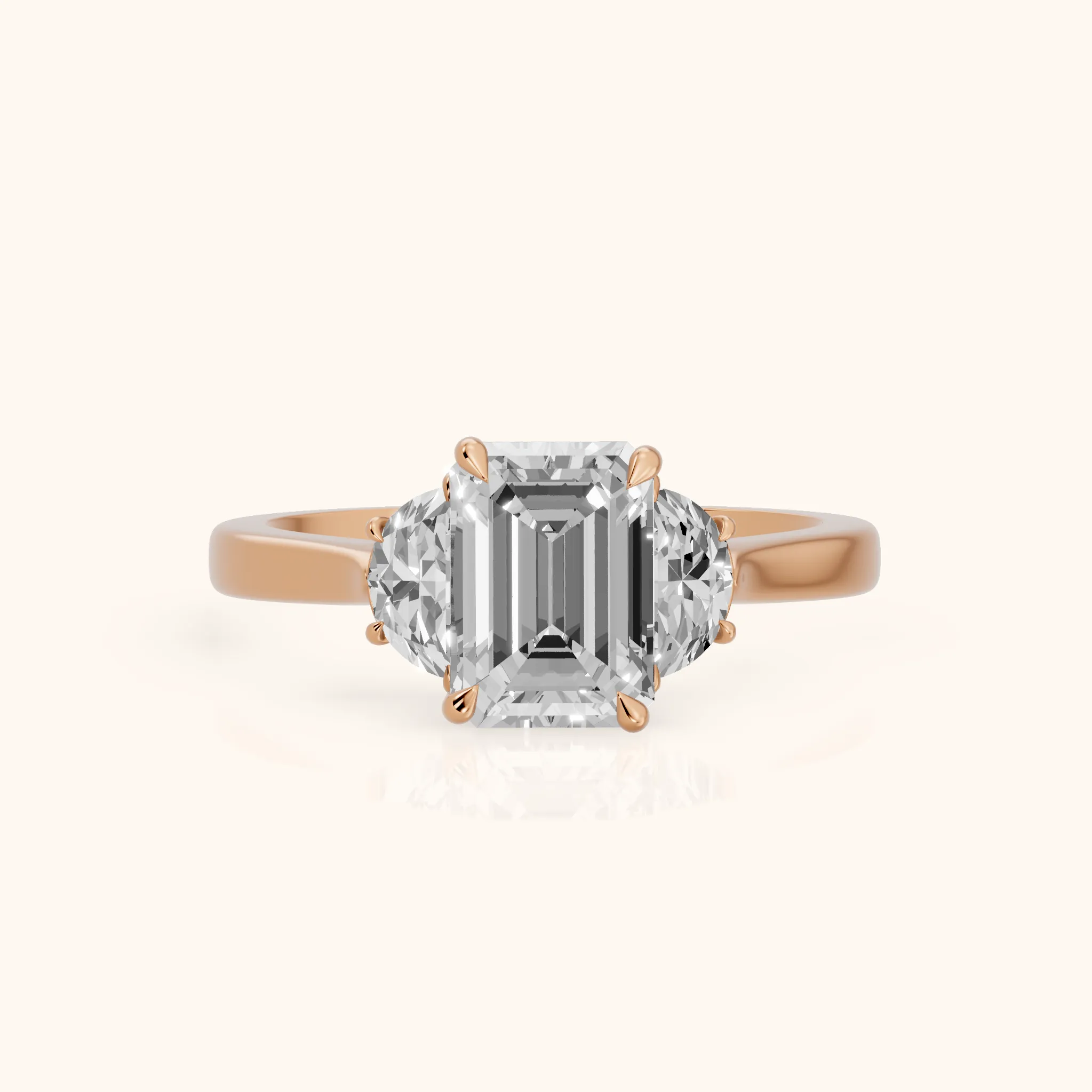 Romy Three-Stone Emerald Diamond Engagement Ring in Rose Gold — view 1