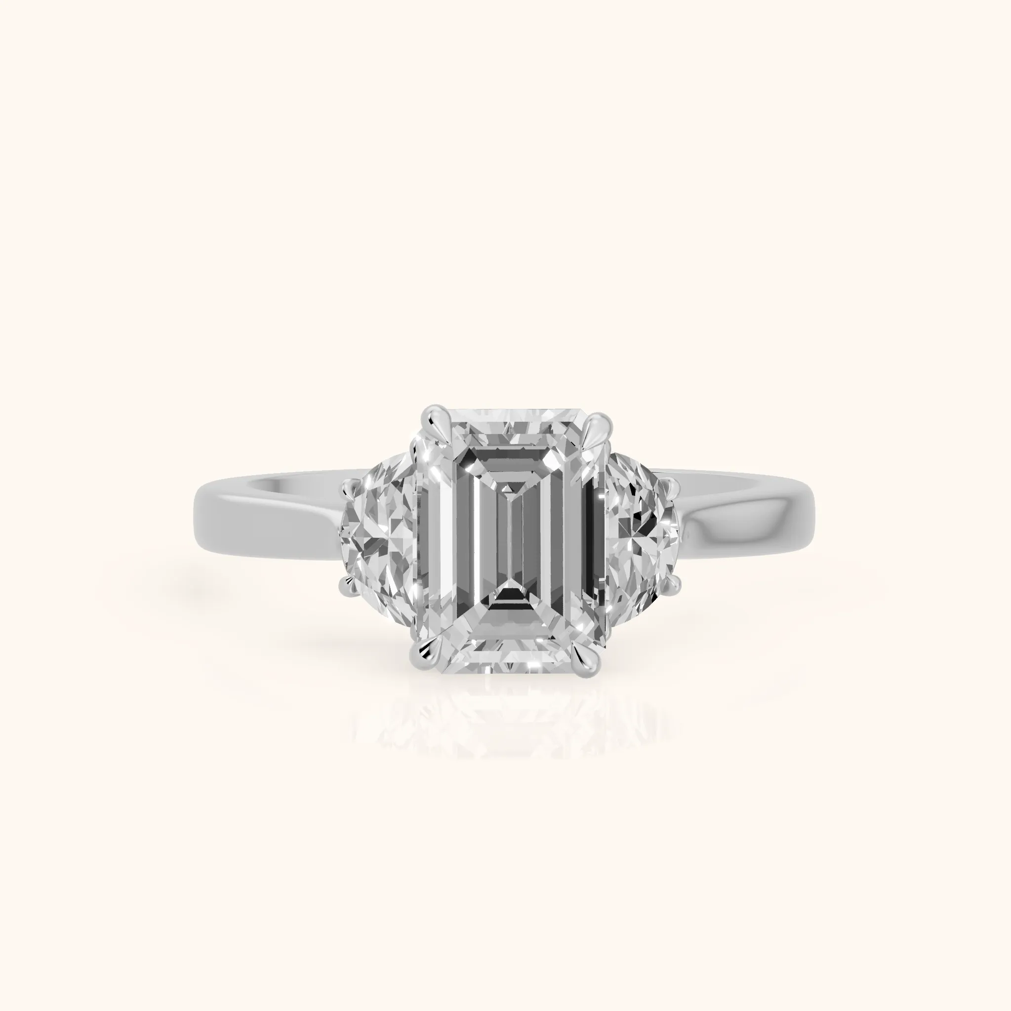 Romy Three-Stone Emerald Diamond Engagement Ring in Platinum — view 1