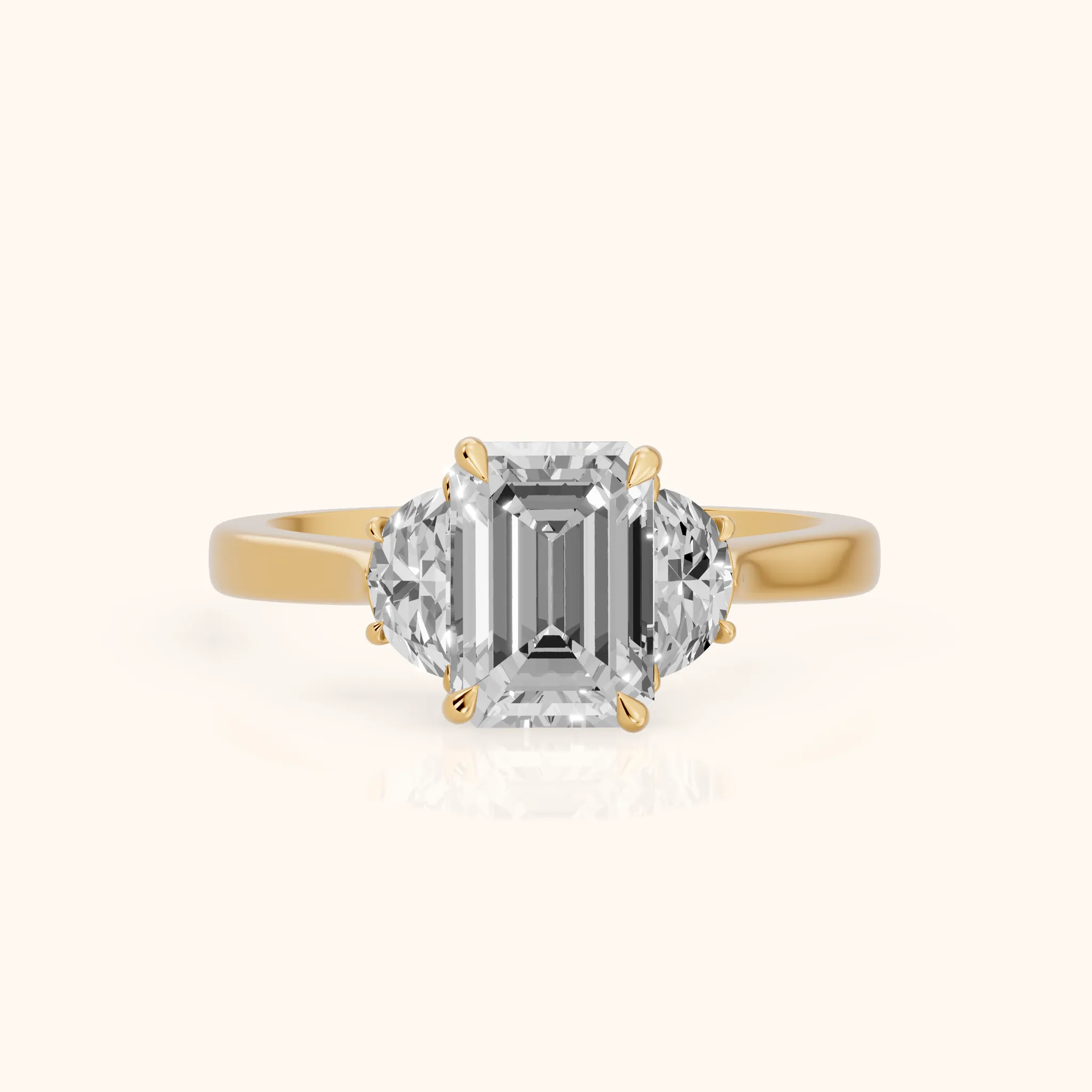 Romy Three-Stone Emerald Diamond Engagement Ring in Yellow Gold — view 1