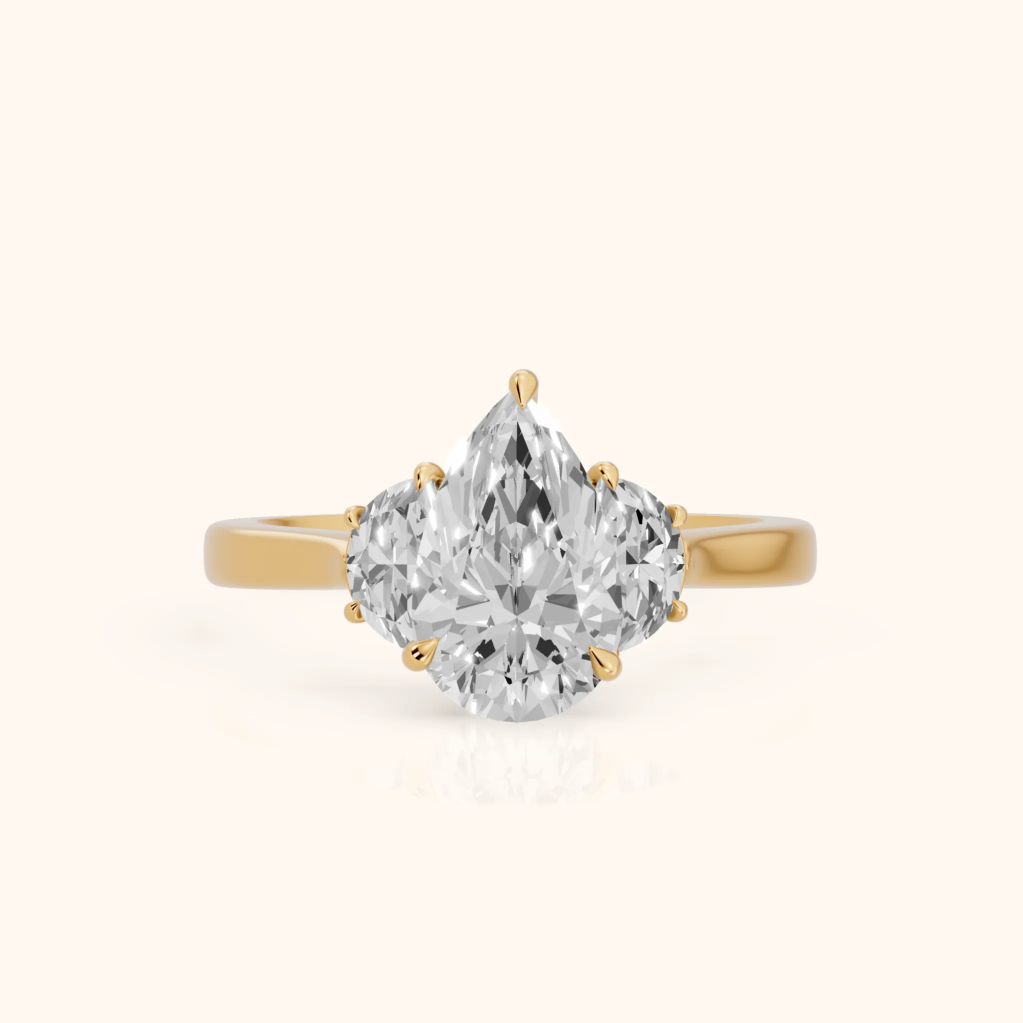 Romy Three-Stone Pear Diamond Engagement Ring in Yellow Gold — view 1