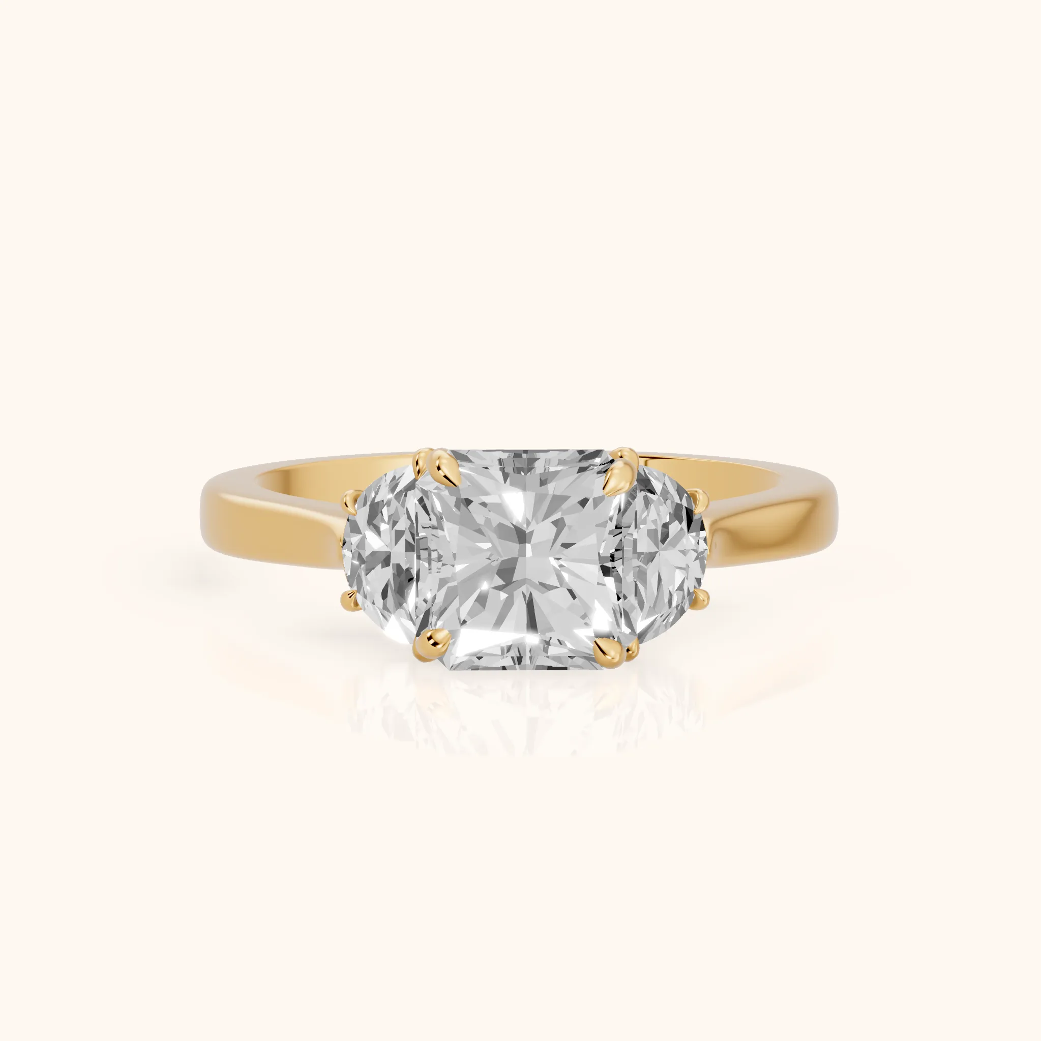 Romy Three-Stone Radiant Diamond Engagement Ring in Yellow Gold — view 1