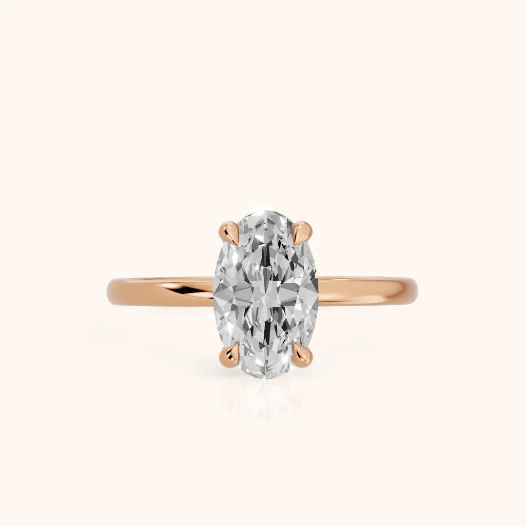 Nella Petite Solitaire Oval Diamond Engagement Ring in Rose Gold — view 2